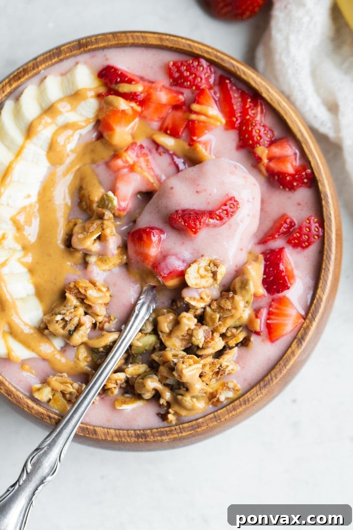 Close-up of a thick, creamy Strawberry Banana Smoothie Bowl before toppings.