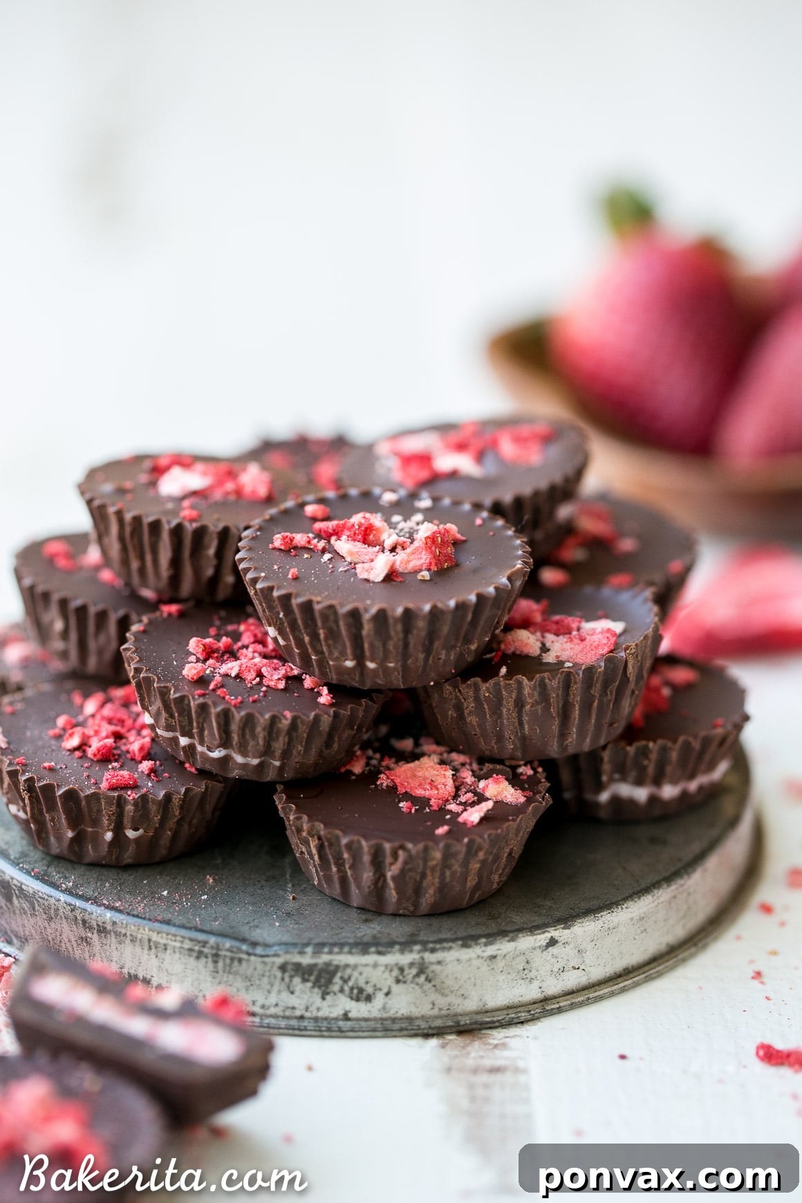Chocolate strawberry cups decorated with colorful sprinkles, a fun and festive twist on the classic healthy candy. Perfect for celebrations.