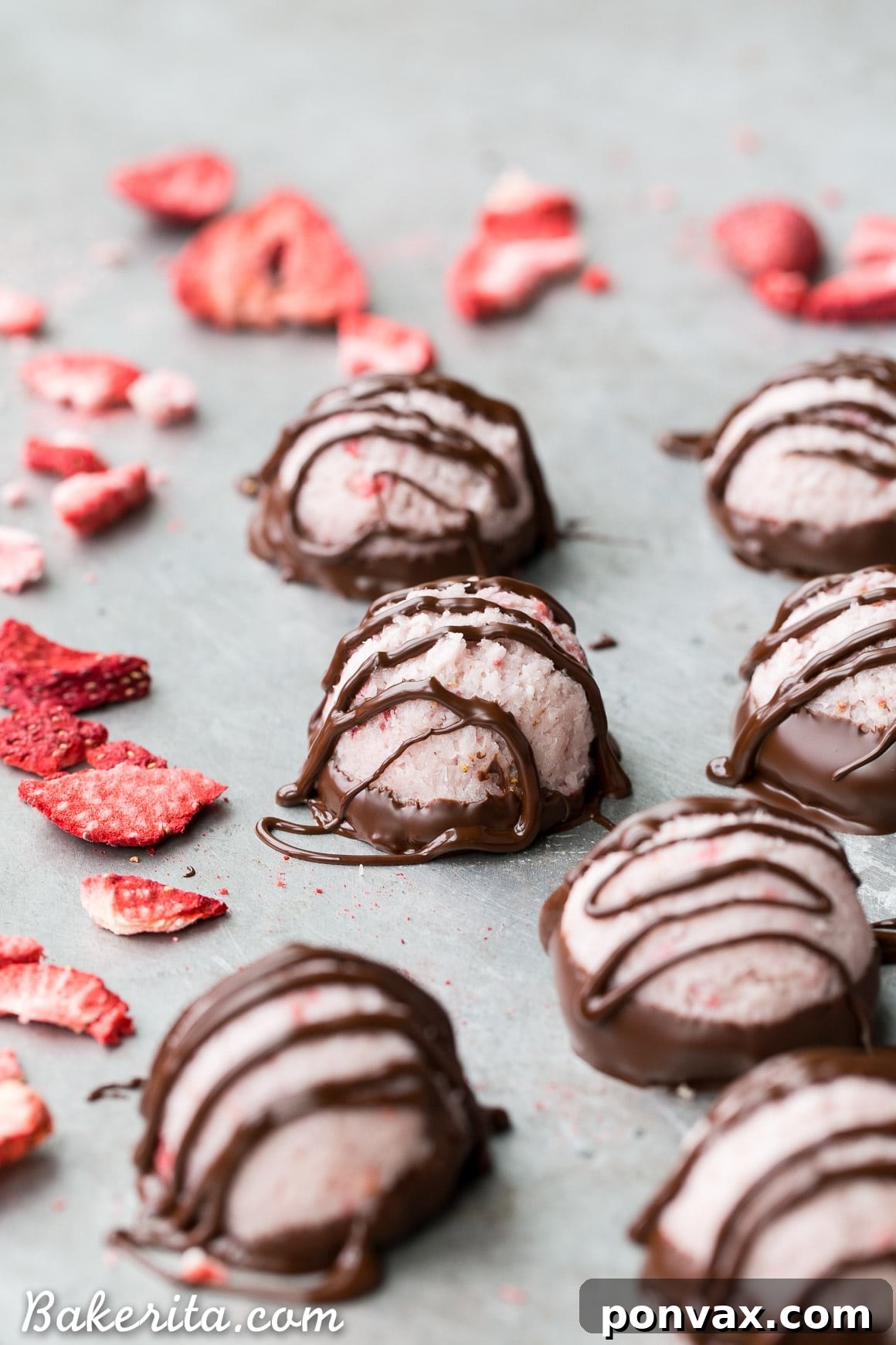 No Bake Vegan Chocolate Covered Strawberry Macaroons 2 Creamy No-Bake Chocolate Dipped Strawberry Macaroons, gluten-free, Paleo, and vegan, showcasing a rich strawberry flavor and decadent chocolate coating.