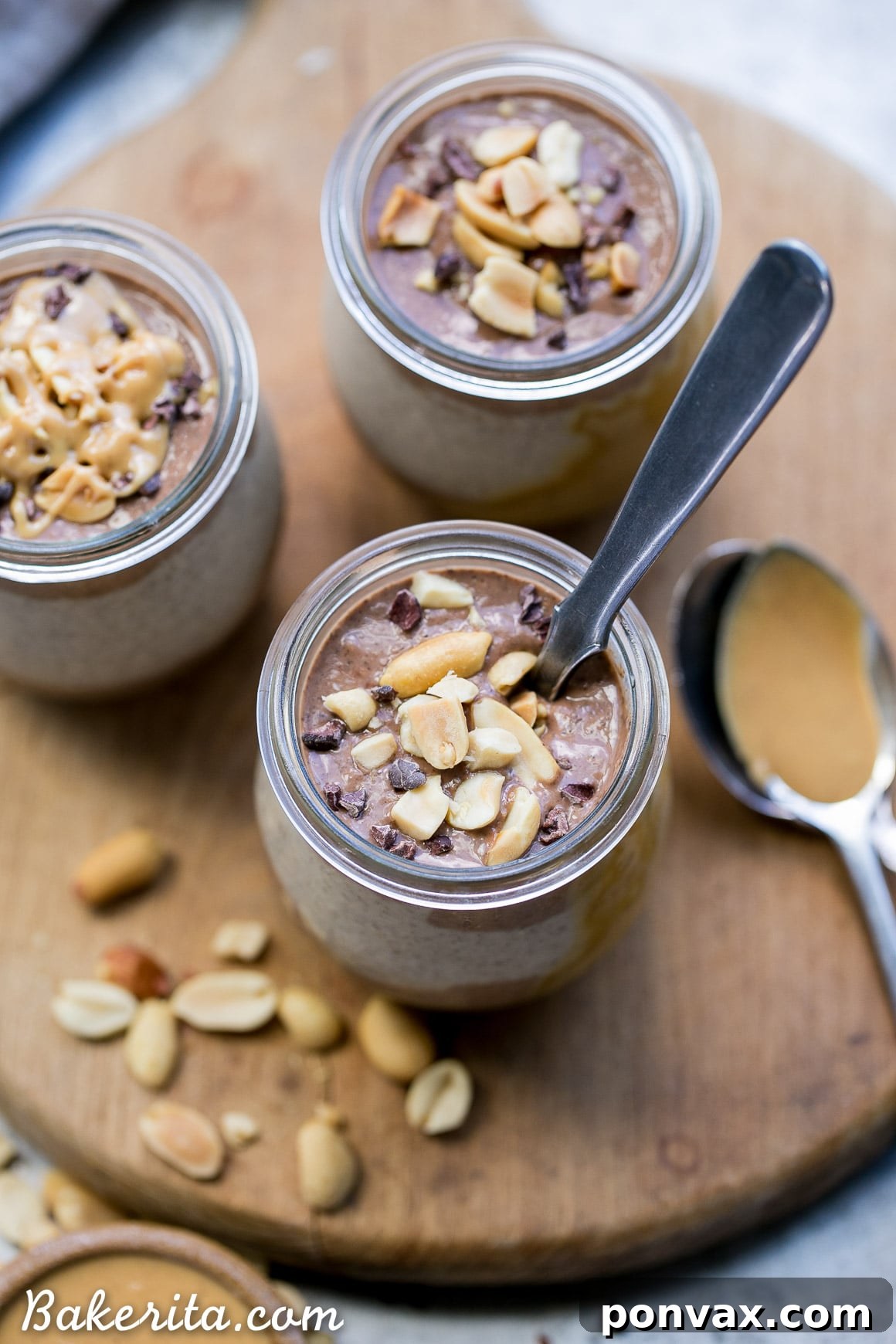 Close-up shot of the rich, smooth peanut butter layer of the chia pudding, showcasing its creamy texture in a clear glass.