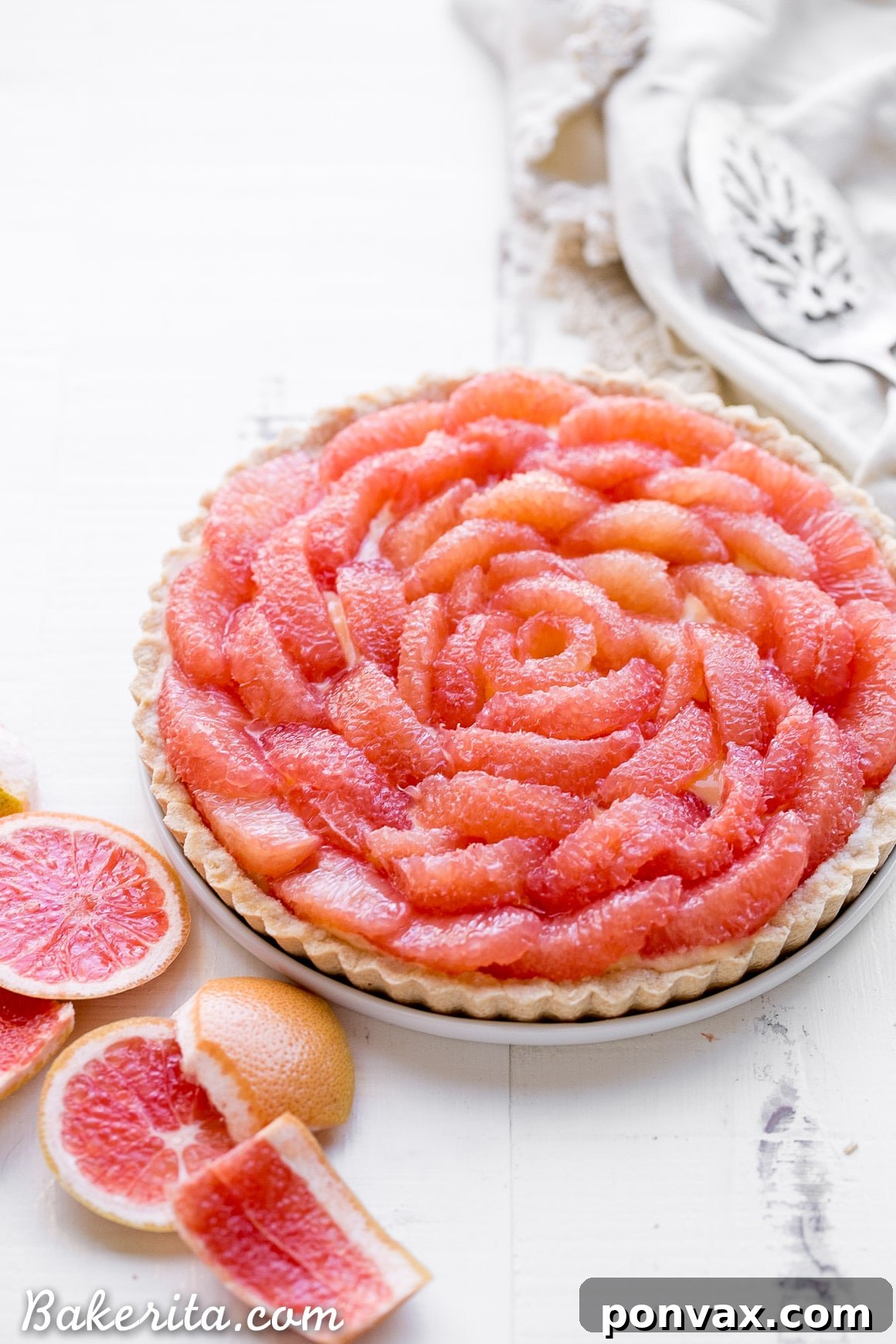 The golden brown, perfectly baked ginger-spiced coconut flour tart crust cooling, awaiting its delicious filling.