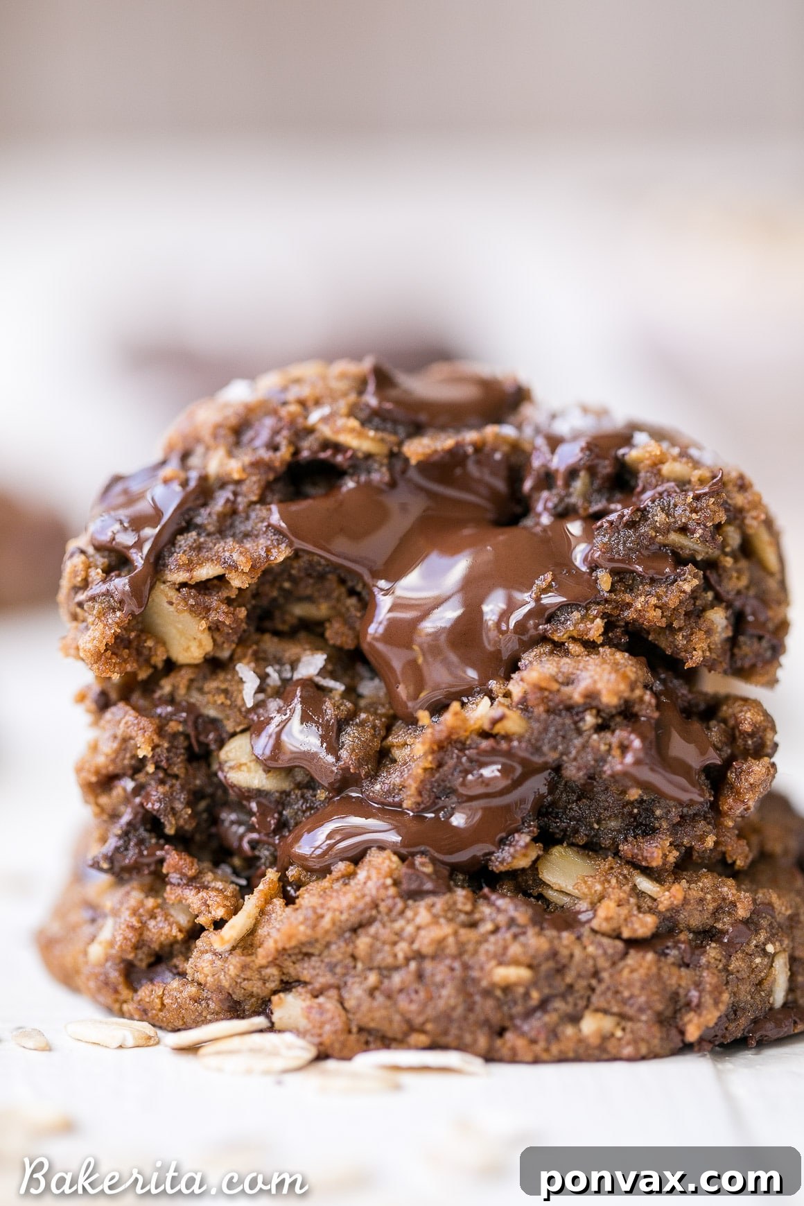 Chewy Gluten-Free Vegan Oatmeal Chocolate Chip Cookies 4 Indulge in these healthy oatmeal chocolate chip cookies: vegan, gluten-free, and refined sugar-free, with a perfect balance of crispy edges and a chewy, chocolate-filled interior.