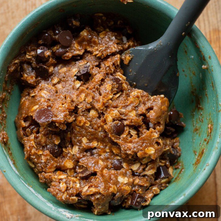 Gluten-Free Oatmeal Chocolate Chip Skillet Delight 13 Image showing the finished cookie dough with chocolate chips, ready for baking.