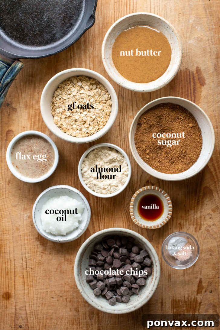 Gluten-Free Oatmeal Chocolate Chip Skillet Delight 4 A generous serving of the Oatmeal Chocolate Chip Skillet Cookie with a scoop of vanilla ice cream melting on top.