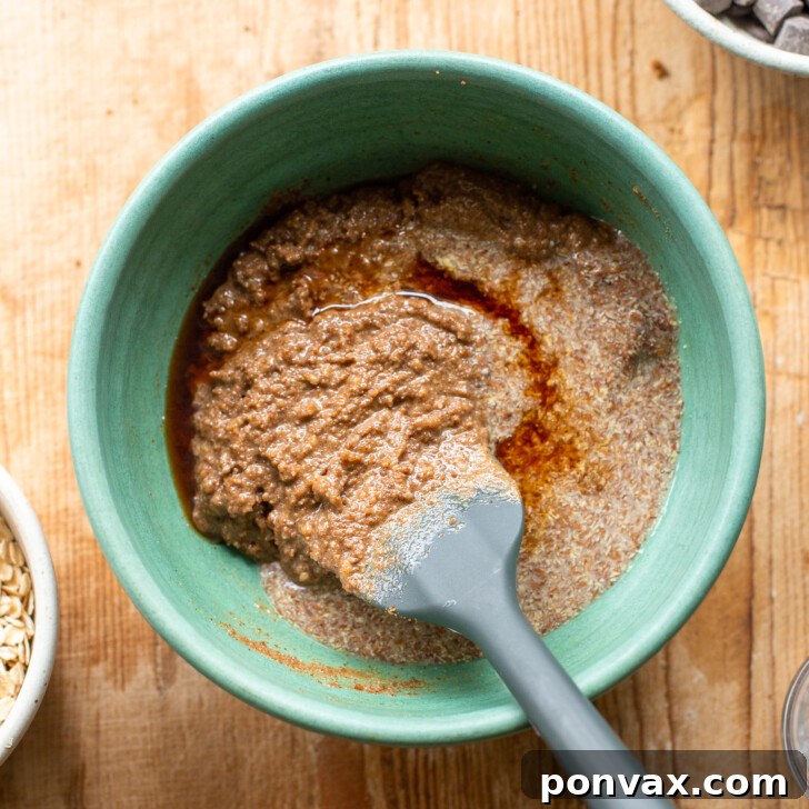 Gluten-Free Oatmeal Chocolate Chip Skillet Delight 8 Image showing the wet ingredients mixture after being fully combined.