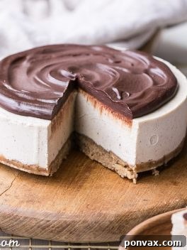 Pure Vanilla Bliss: No-Bake Cheesecake for All 7 A mouthwatering No-Bake Vanilla Bean Cheesecake with Chocolate Ganache, perfectly ready to be served. Gluten-free, Paleo, and vegan.
