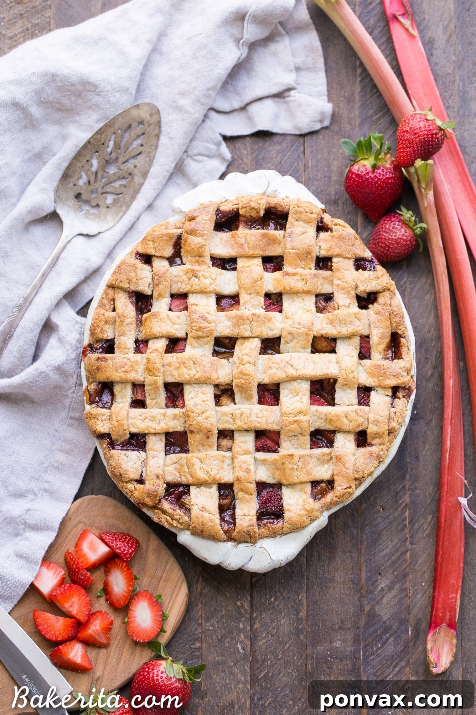 Heavenly Gluten Free Strawberry Rhubarb Pie 2 A slice of gluten-free strawberry rhubarb pie with a lattice crust, showcasing the vibrant fruit filling and flaky crust.