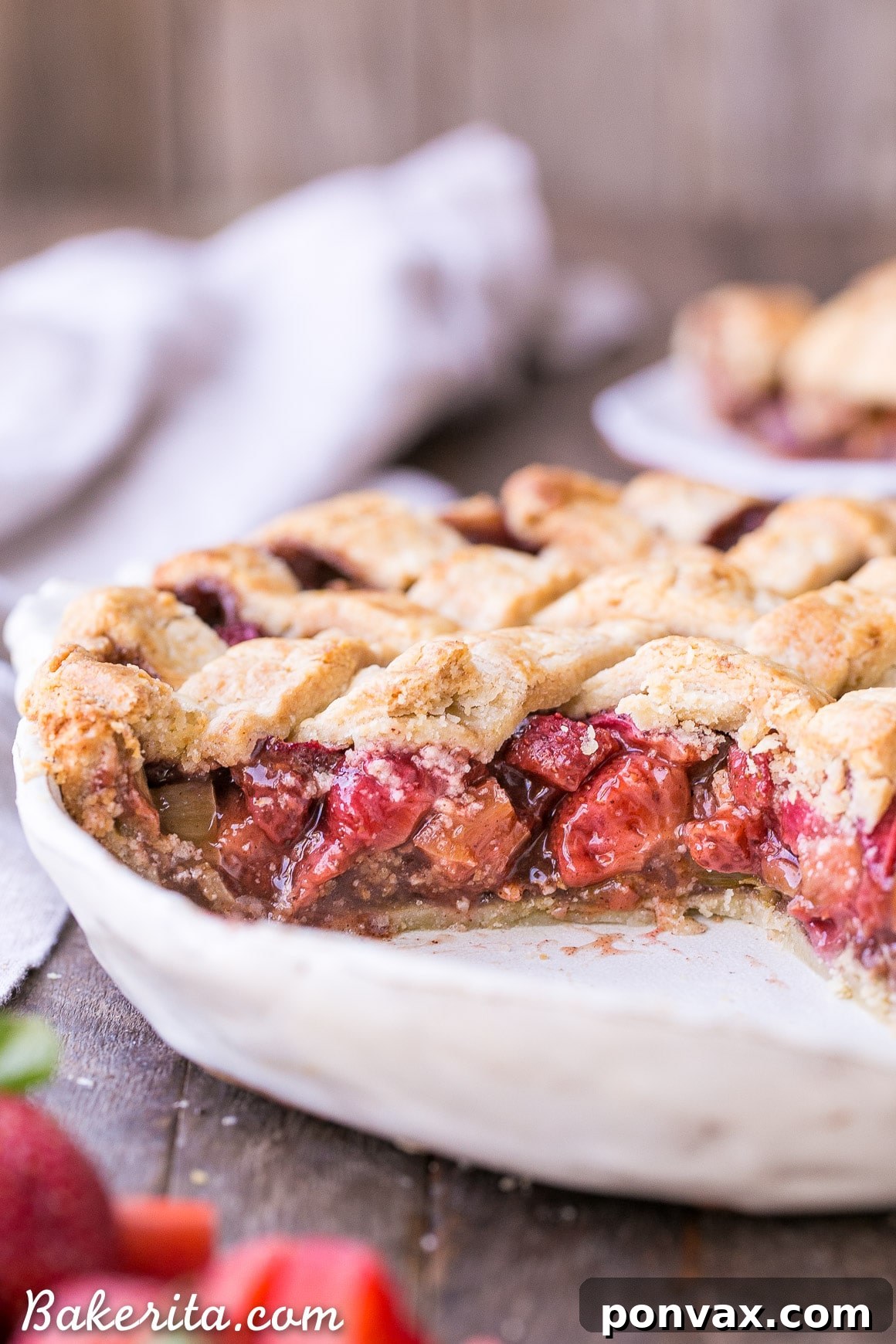 Heavenly Gluten Free Strawberry Rhubarb Pie 5 A bowl filled with chopped fresh strawberries and rhubarb, ready to be mixed for the pie filling.