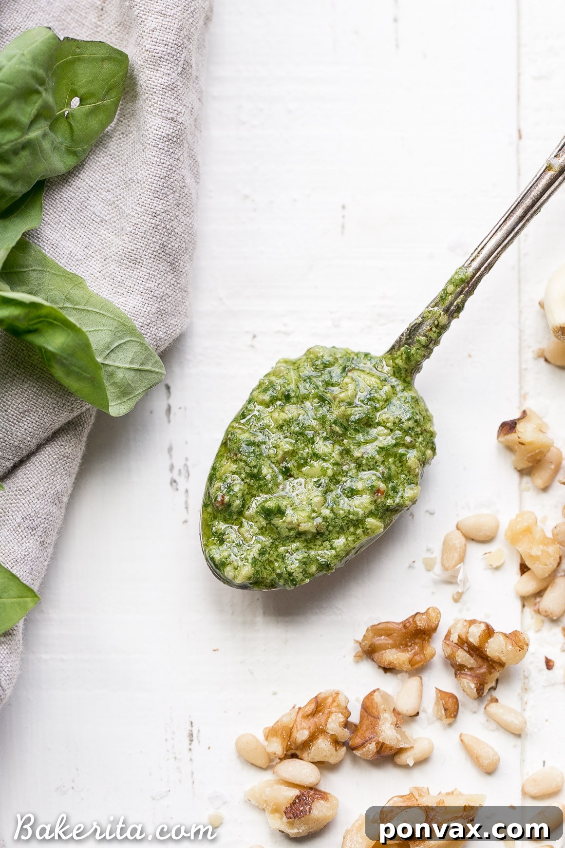 This Spinach Basil Pesto is loaded with bright herby flavor and made in just a few minutes. You won't miss the cheese in this paleo, vegan + Whole30-friendly pesto. It will make any meal more flavorful, whether it's tossed with pasta, enjoyed with your favorite protein, or used as a spread.