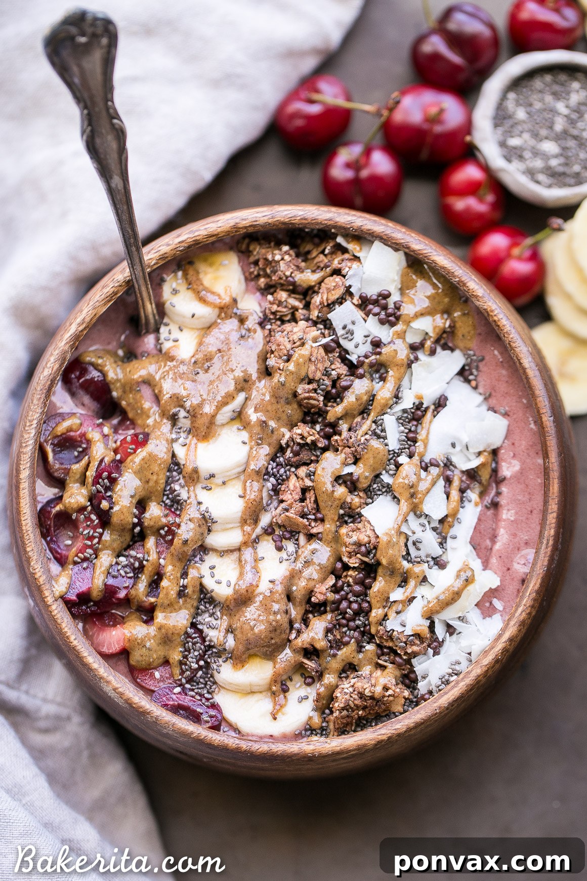Cherry Banana Bliss Bowl 2 Vibrant Banana Cherry Smoothie Bowl topped with fresh cherries, banana slices, and crunchy granola, a perfect healthy breakfast