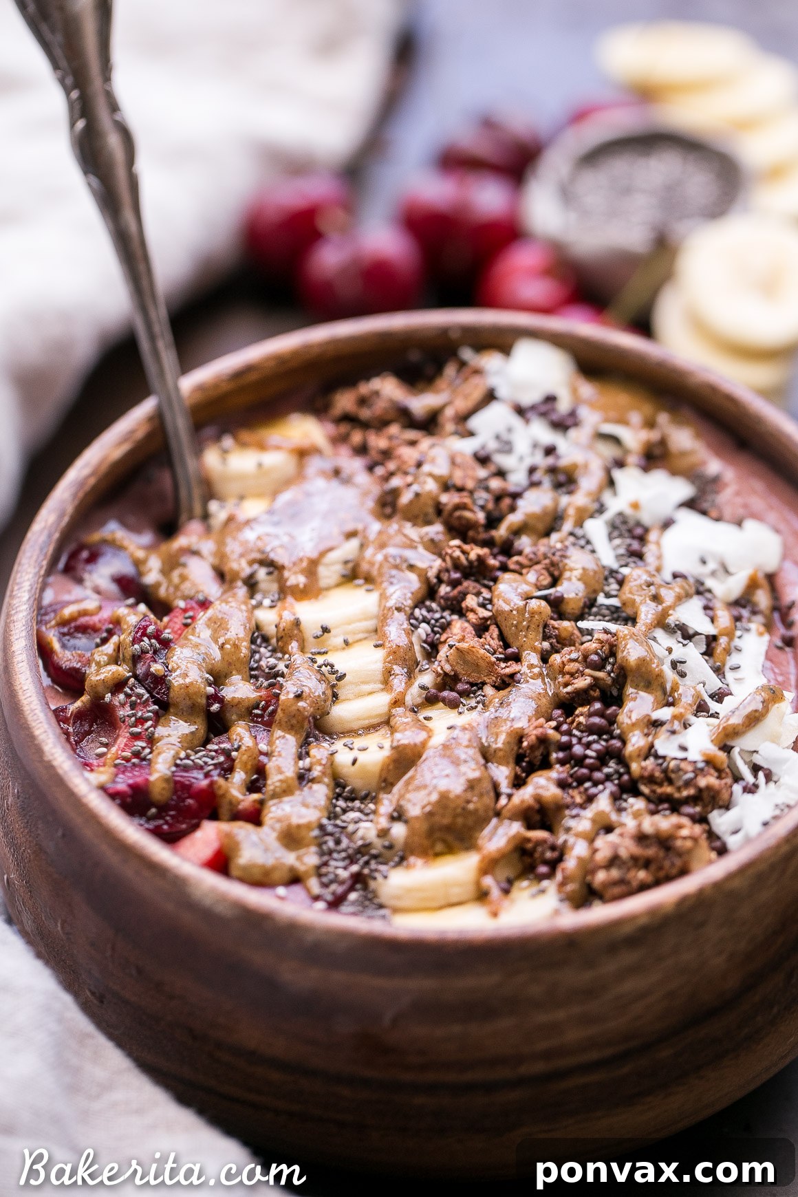 Cherry Banana Bliss Bowl 4 A beautifully presented Banana Cherry Smoothie Bowl from a top-down perspective, featuring various toppings