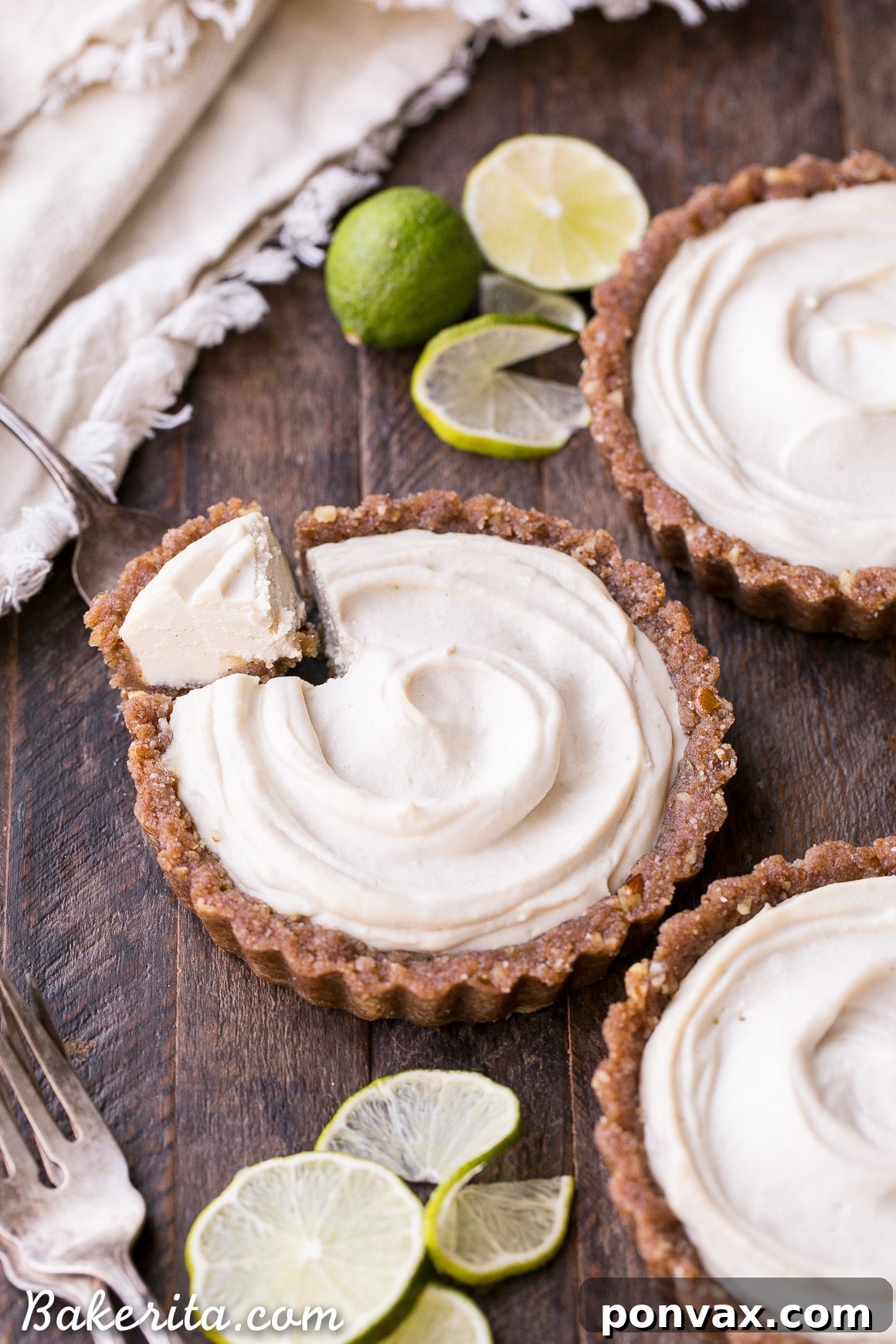 Refreshing Gluten-Free & Vegan No-Bake Lime Tarts 3 Close-up of a No-Bake Lime Tart, showcasing its creamy texture and vibrant green filling. A delightful gluten-free and vegan dessert.
