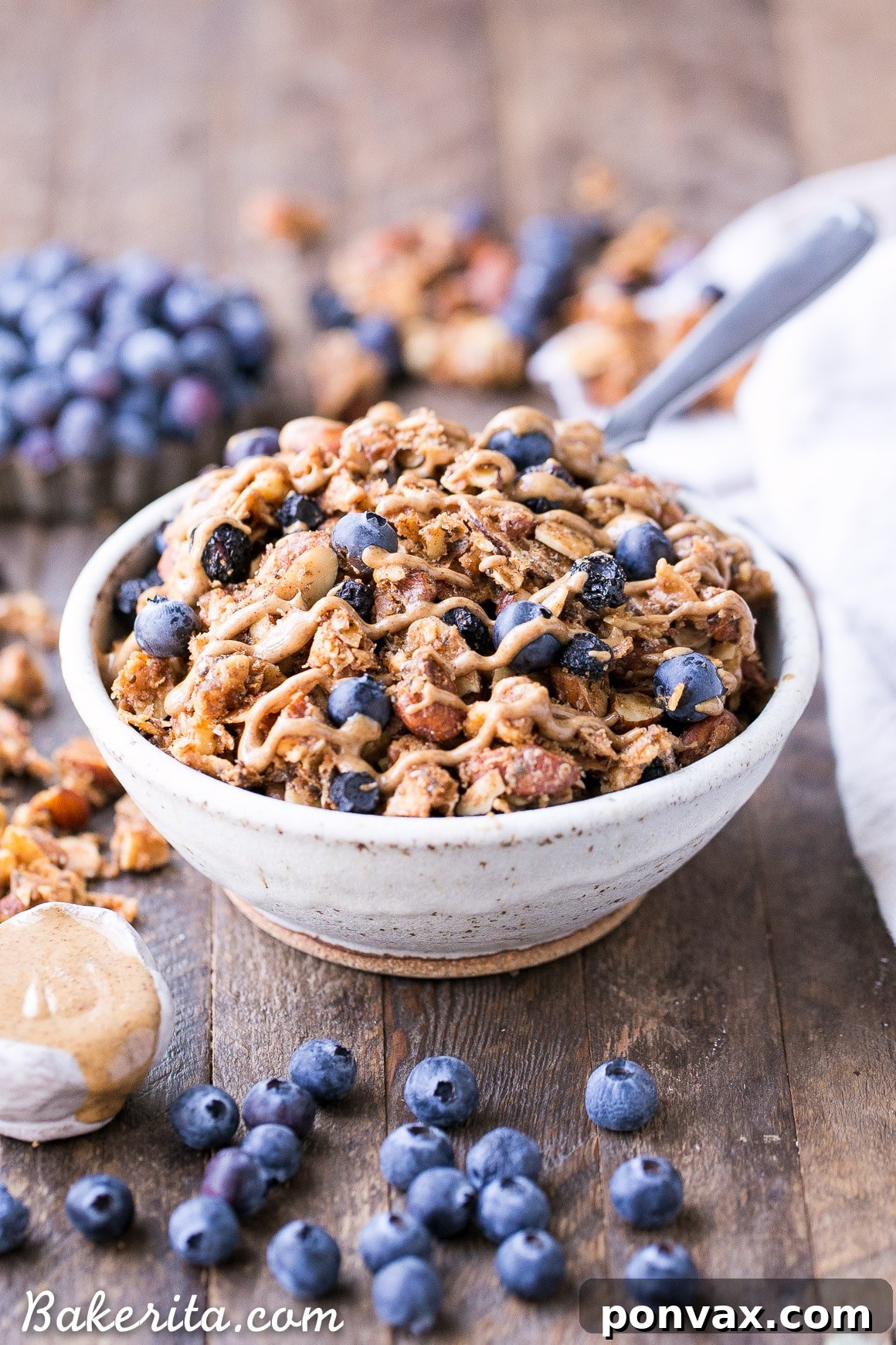 This Blueberry Almond Butter Grain-Free Granola is an easy and satisfying gluten-free, vegan and paleo granola recipe that makes the perfect breakfast or snack. It's made with simple, wholesome ingredients and is loaded with filling nuts and healthy fats to keep you satisfied.
