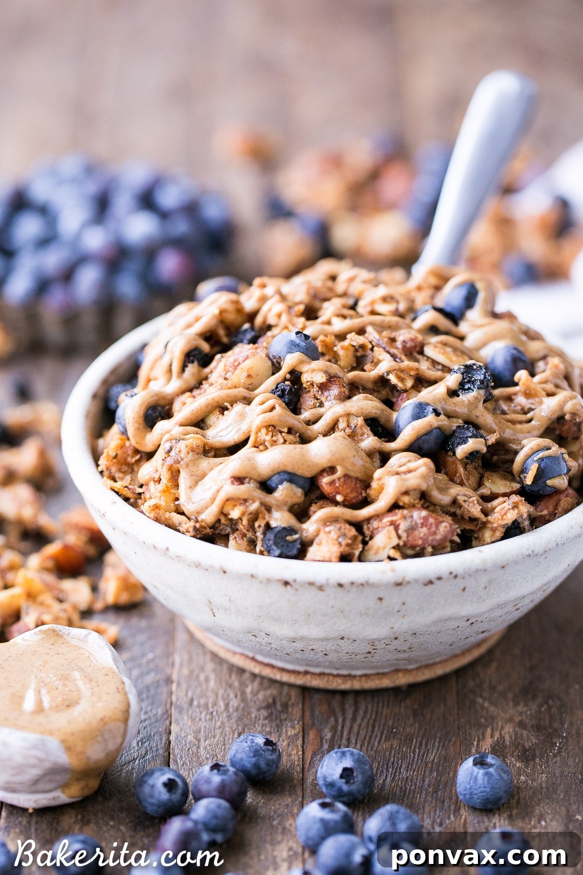This Blueberry Almond Butter Grain-Free Granola is an easy and satisfying gluten-free, vegan and paleo granola recipe that makes the perfect breakfast or snack. It's made with simple, wholesome ingredients and is loaded with filling nuts and healthy fats to keep you satisfied.