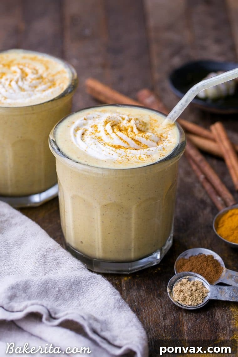 Overhead shot of Golden Milkshake ingredients laid out: Silk Protein Nut Milk, almond butter, coconut oil, turmeric, ginger, cinnamon, and black pepper. Ready for blending.