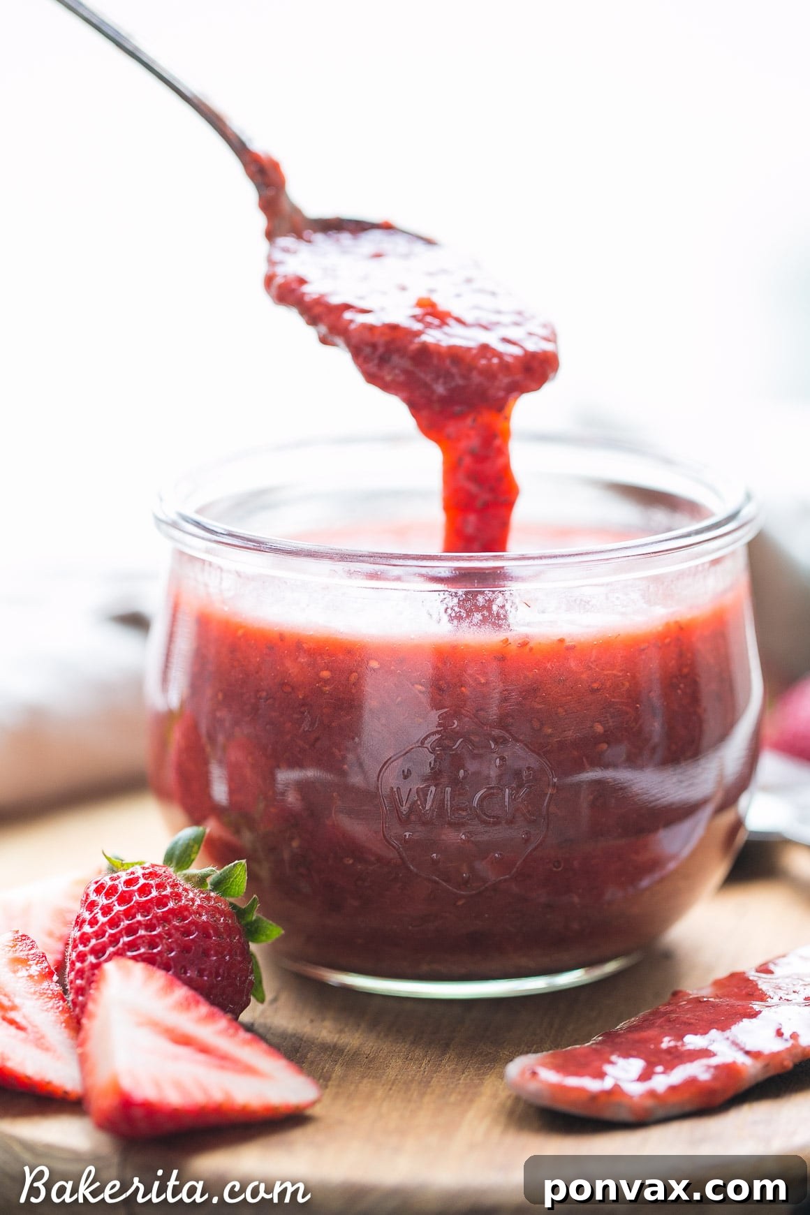 Luscious Paleo Vegan Strawberry Chia Jam 3 Close-up of a bowl of fresh, ripe strawberries, ready for jam making.