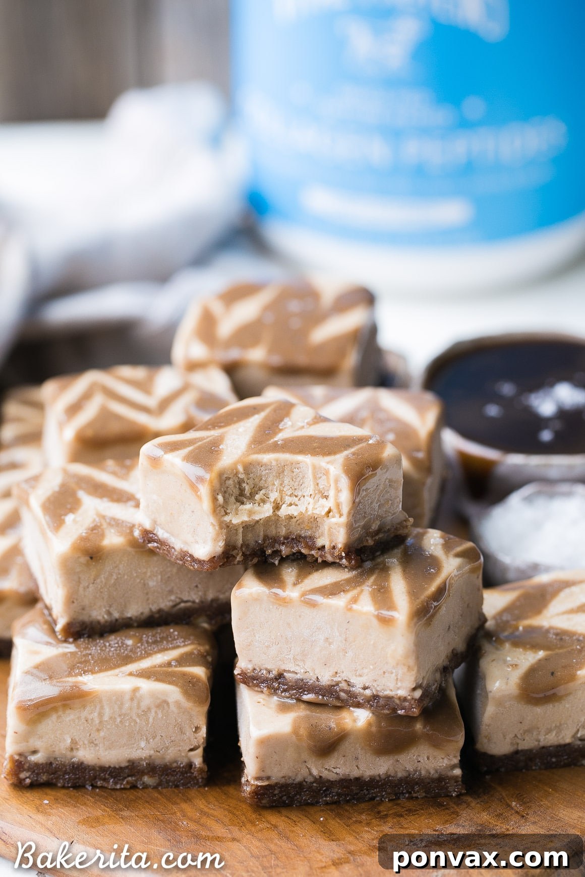 These Frozen Caramel Banana Bars are easy to make in a blender or food processor, and they're super creamy and refreshing. These gluten-free and paleo bars have a chewy pecan-date crust, topped with banana nice cream and a caramel swirl.