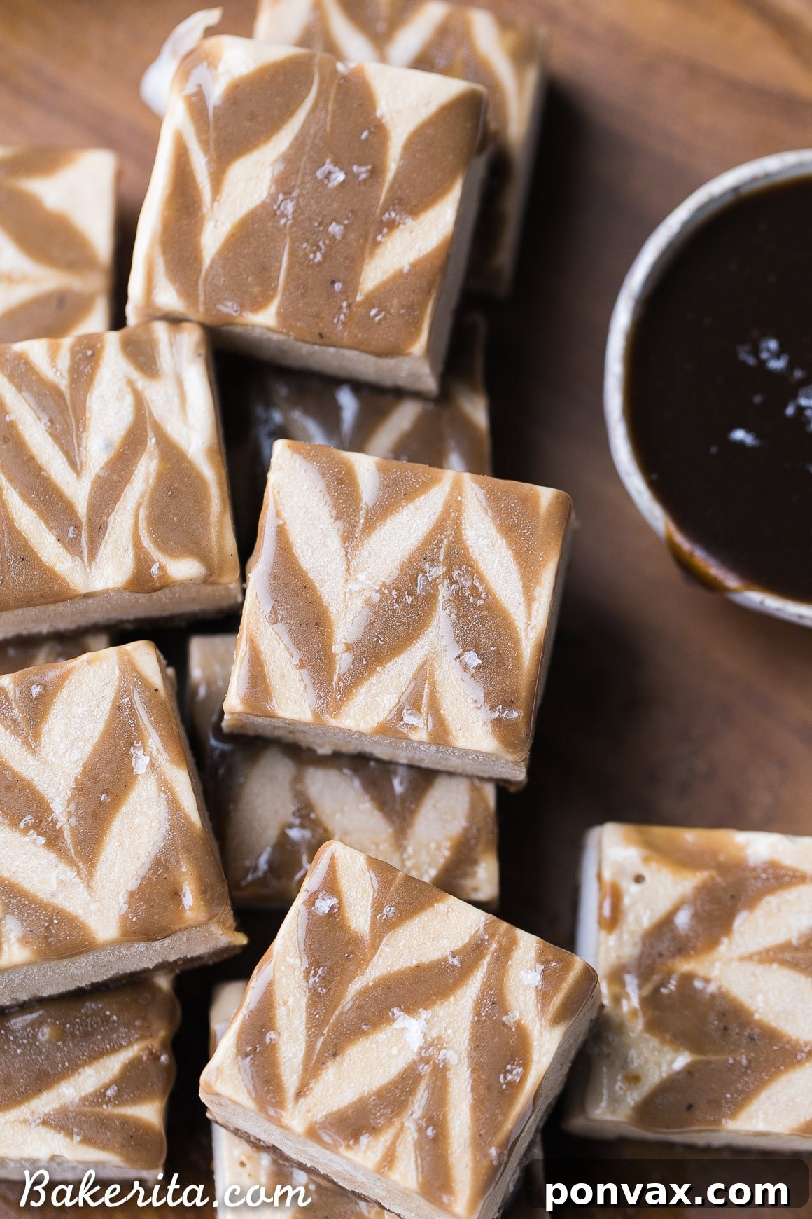 These Frozen Caramel Banana Bars are easy to make in a blender or food processor, and they're super creamy and refreshing. These gluten-free and paleo bars have a chewy pecan-date crust, topped with banana nice cream and a caramel swirl.