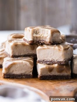 These Frozen Caramel Banana Bars are easy to make in a blender or food processor, and they're super creamy and refreshing. They have a chewy pecan-date crust, topped with banana nice cream and a caramel swirl.