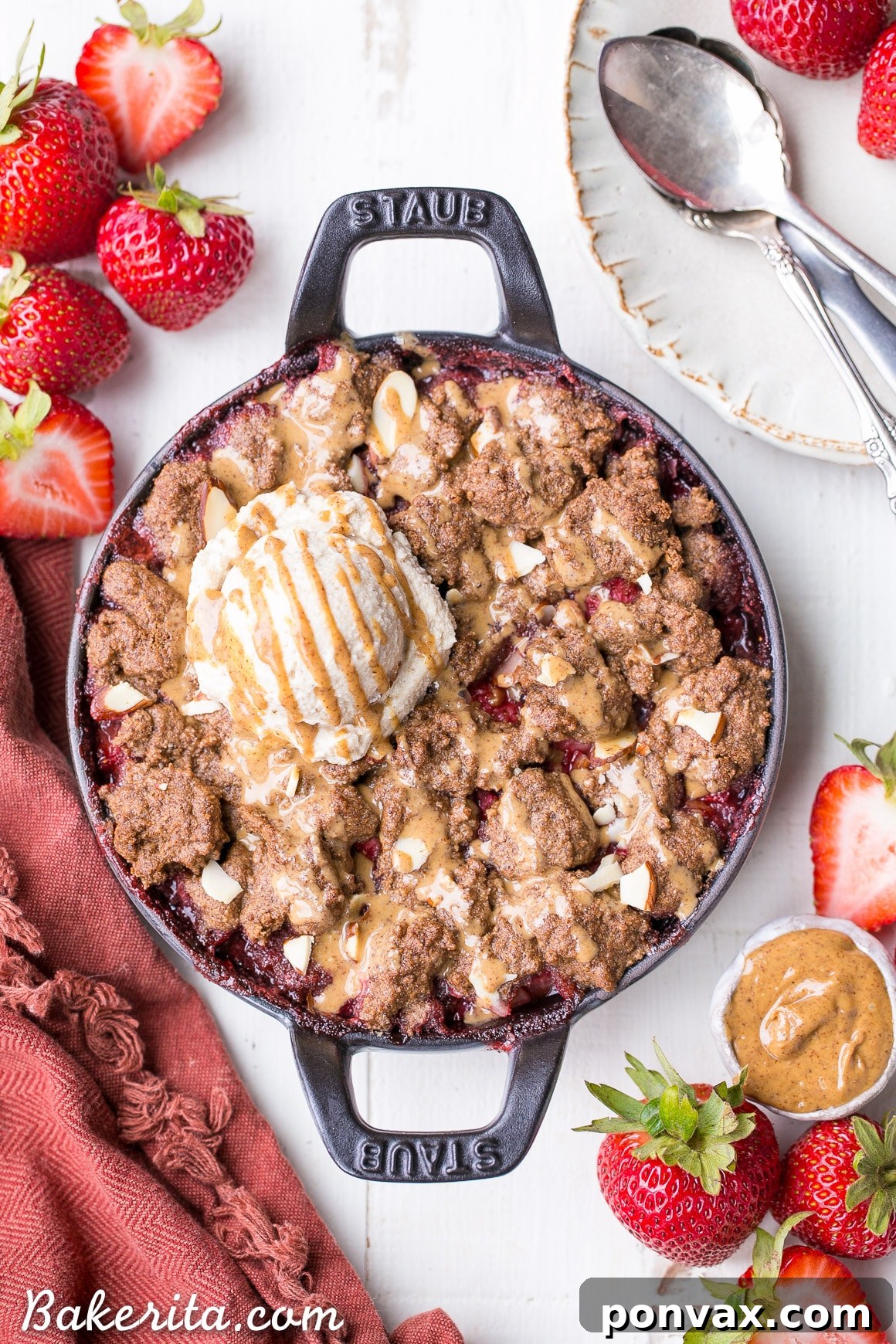 Healthy Indulgence Strawberry Crisp with Almond Butter Crumble 3 Close-up of a single serving of Strawberry Crisp with Almond Butter Crumble, showing the rich strawberry filling.