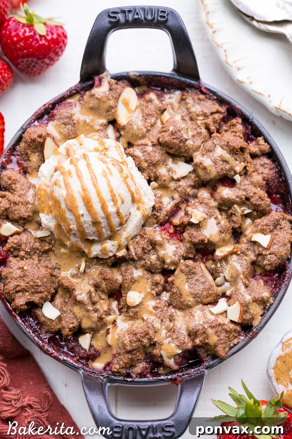 Healthy Indulgence Strawberry Crisp with Almond Butter Crumble 5 The prepared Strawberry Crisp with Almond Butter Crumble in a cast iron pan, before baking.
