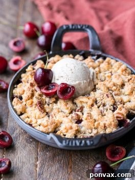 This Cherry Crisp has an irresistible grain-free crumble topping that will have your spoon diving in for more! It's a gluten-free, paleo, and vegan dessert that can be enjoyed all year round.