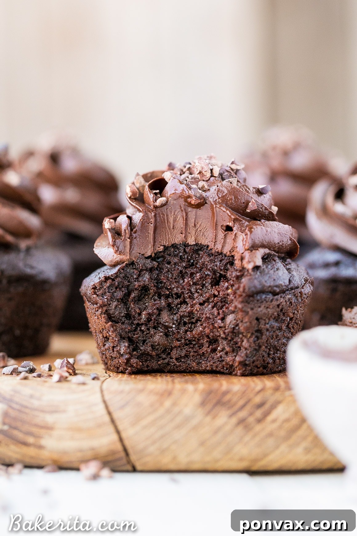 Gluten-Free Chocolate Zucchini Cupcakes: a moist, chocolatey treat with hidden veggies and a delicious Paleo chocolate frosting.