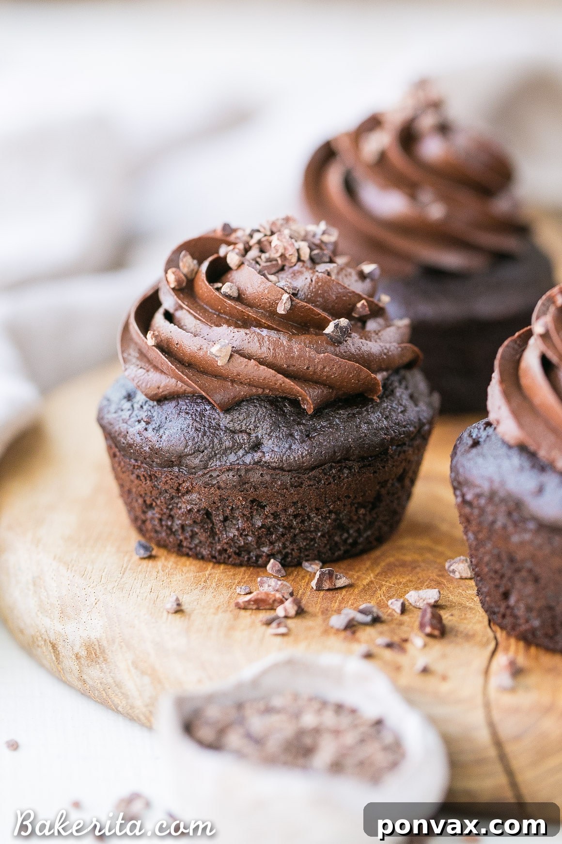Deliciously moist Gluten-Free Chocolate Zucchini Cupcakes with a dairy-free, refined sugar-free frosting.