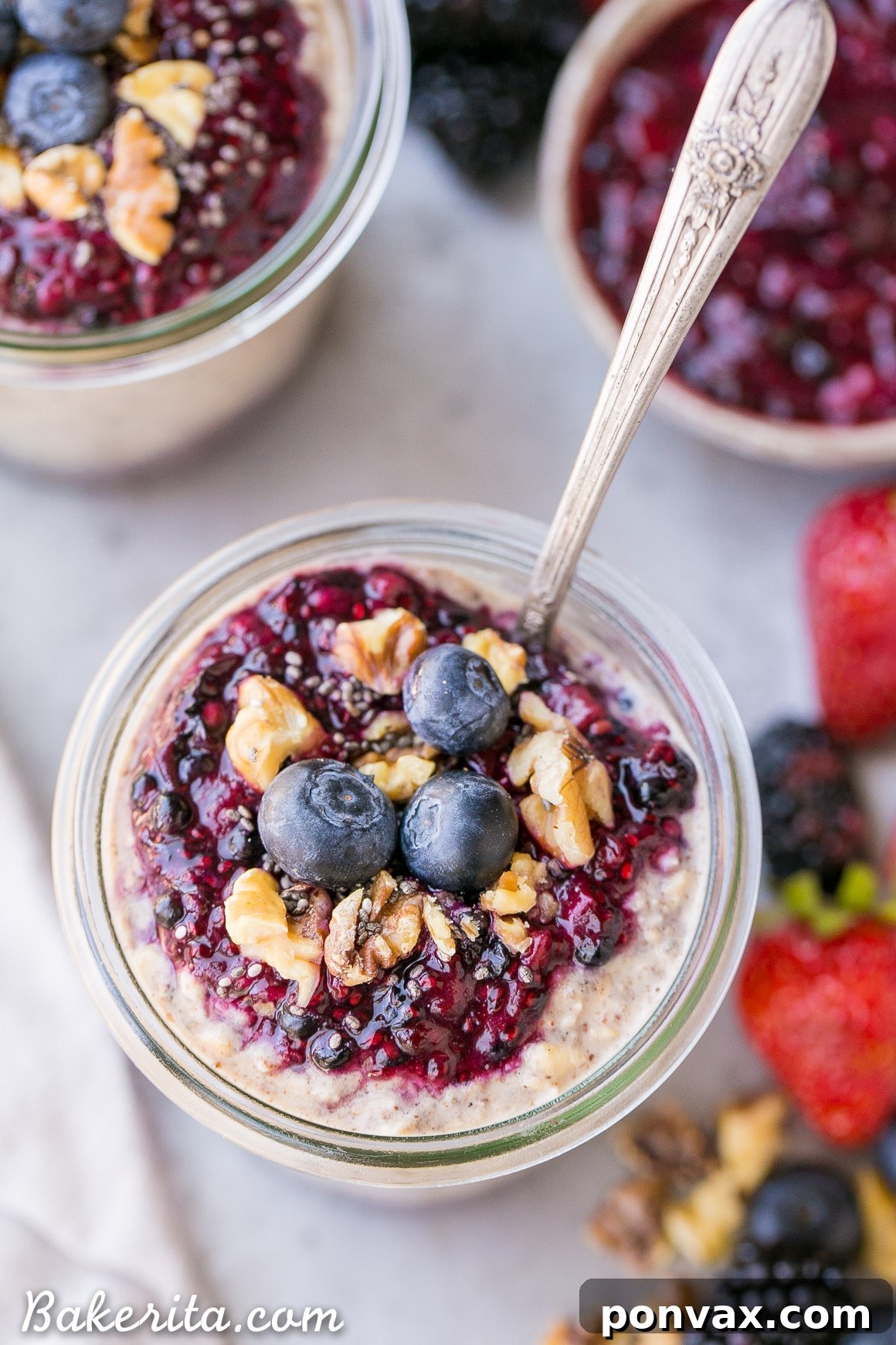 Ingredients for Superfood Overnight Oats laid out, including oats, chia seeds, maca powder, and various spices.