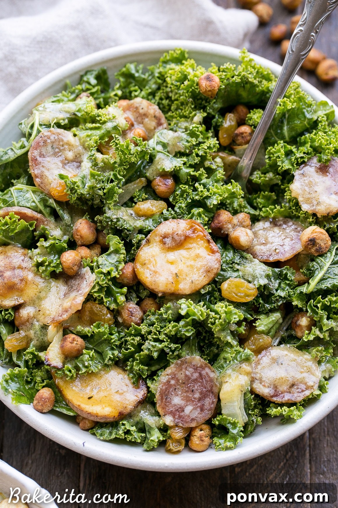A serving of the Kale & Salami Salad, showcasing the rich colors and textures of the ingredients.