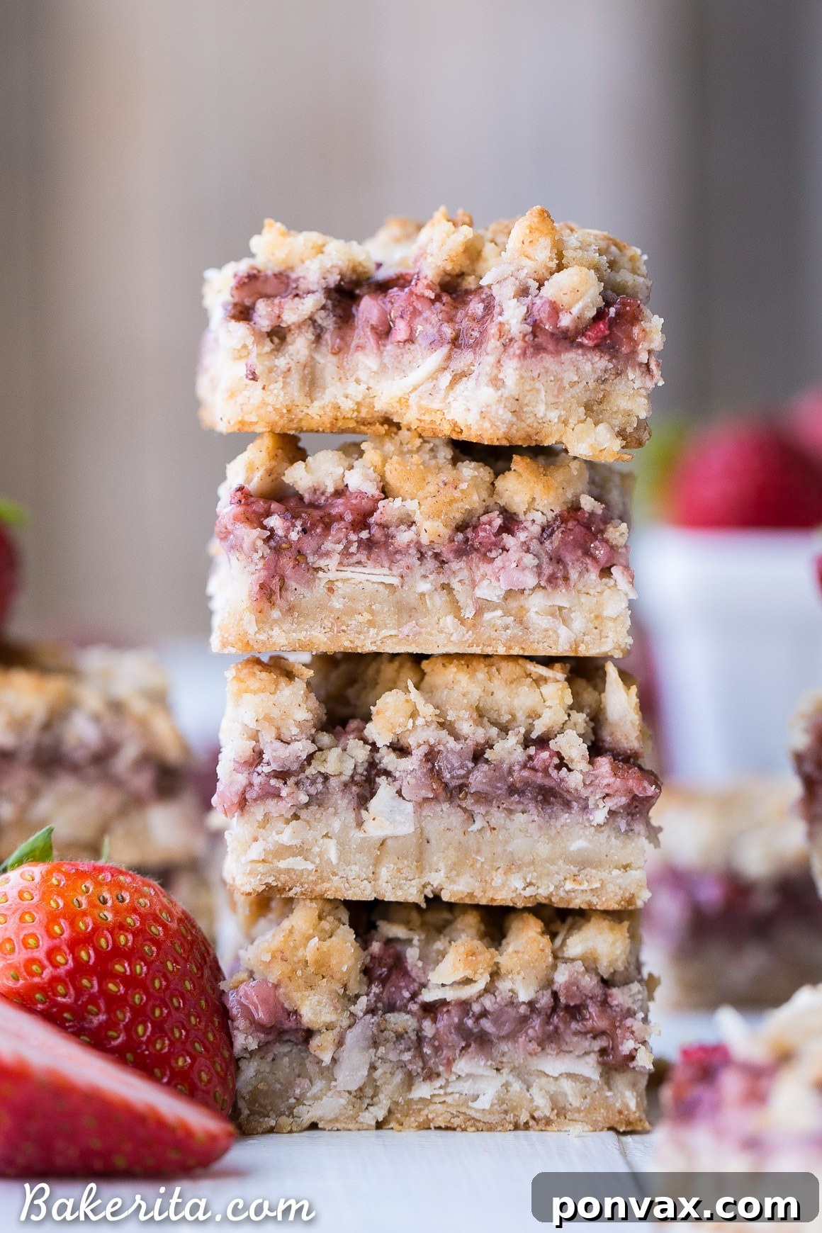 Close-up of freshly baked Strawberry Crumble Bars showing the crumbly top and fruit filling.