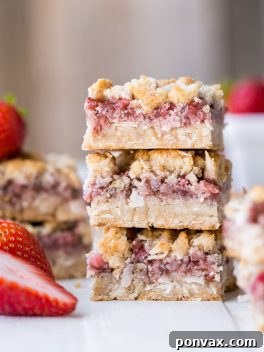 Delicious Strawberry Crumble Bars with a golden, textured topping and sweet fruit filling.