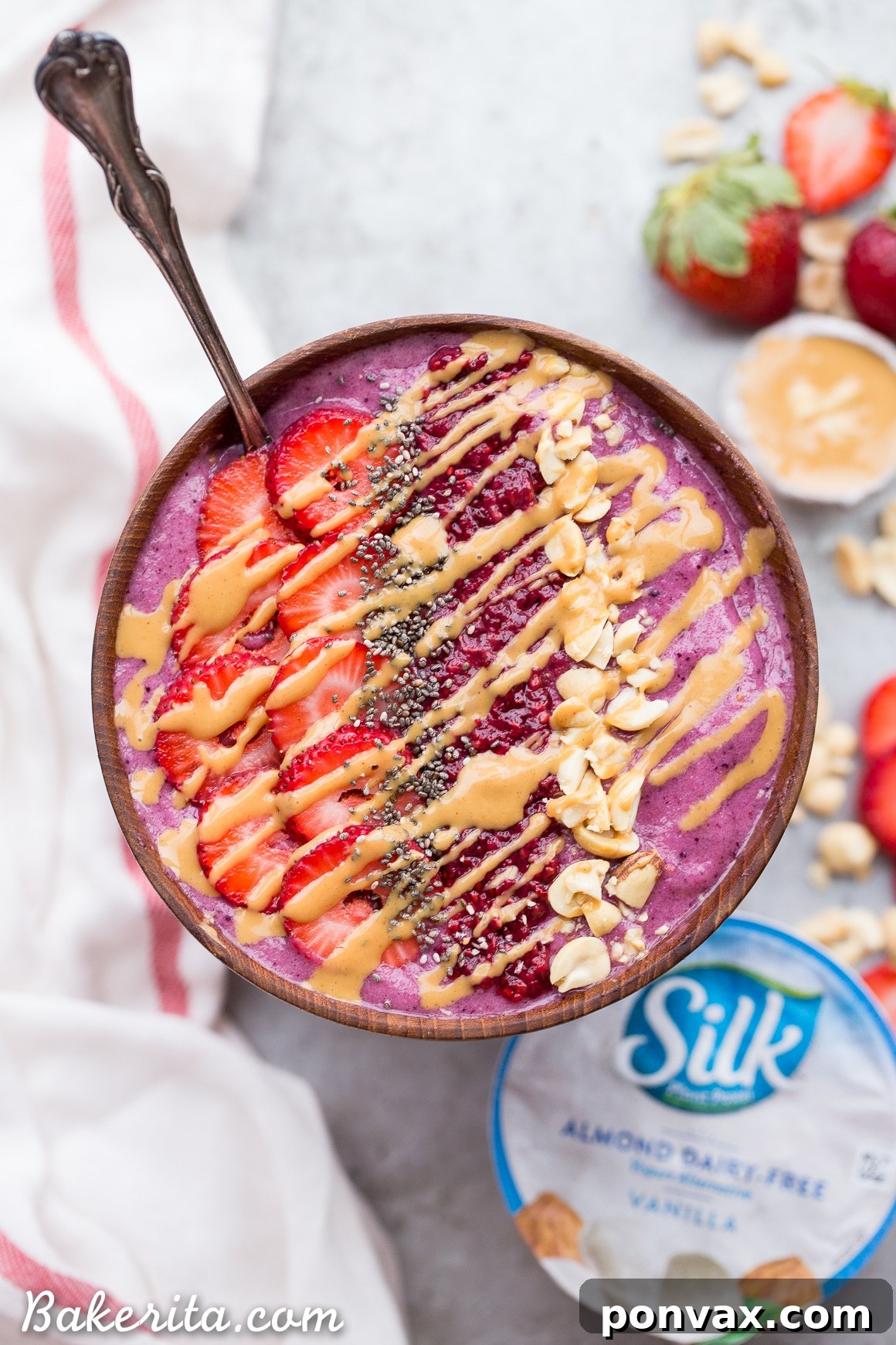 PBJ Smoothie Bowl Vegan Gluten Free 5 Dive into a luxurious Peanut Butter & Jelly Smoothie Bowl, enhanced with Silk Almond Dairy-Free Yogurt Alternative for unmatched creaminess. This gluten-free and vegan recipe, featuring hidden vegetables, is a truly satisfying breakfast.