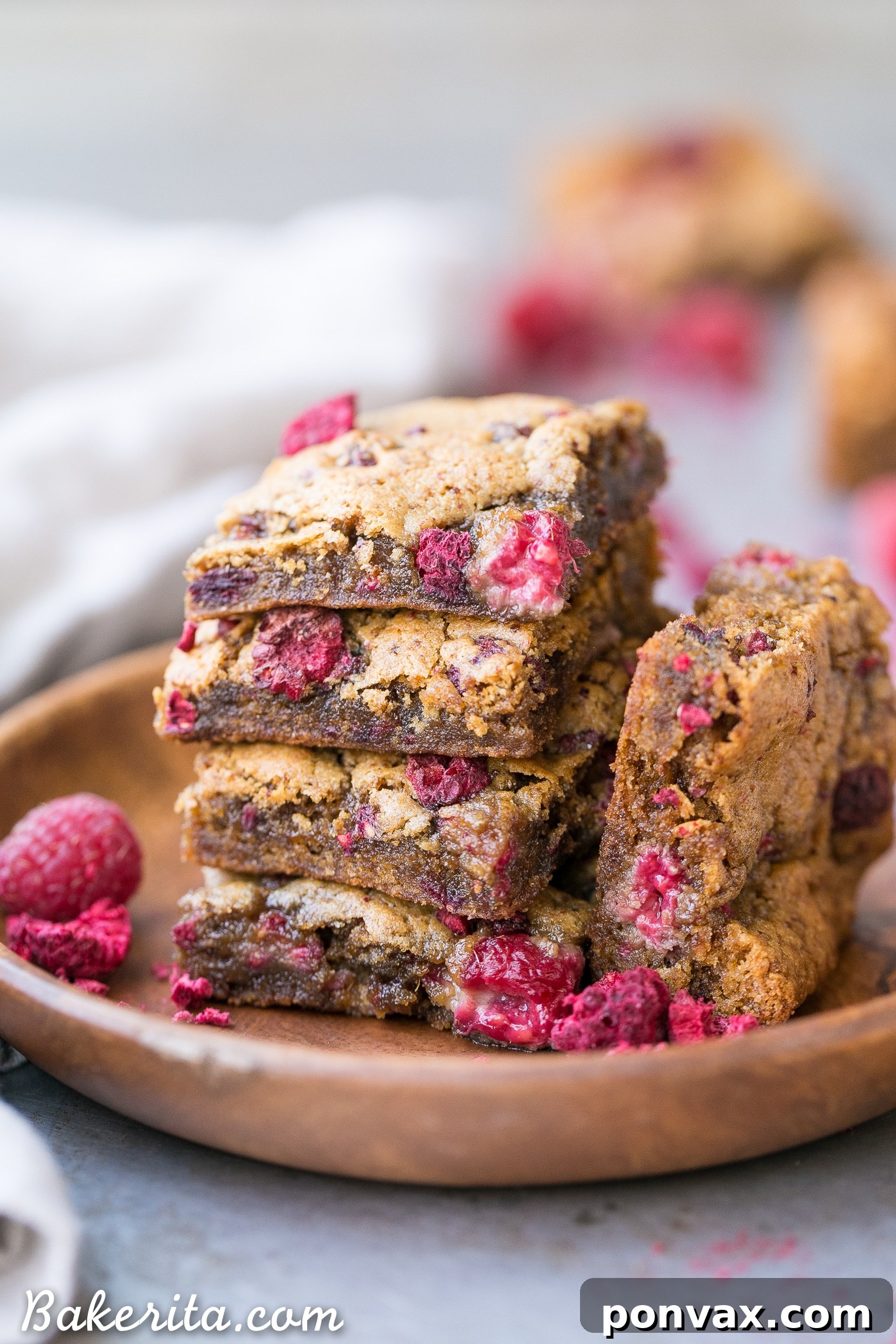 A final shot of vegan raspberry blondies artfully arranged, ready to be served or enjoyed.