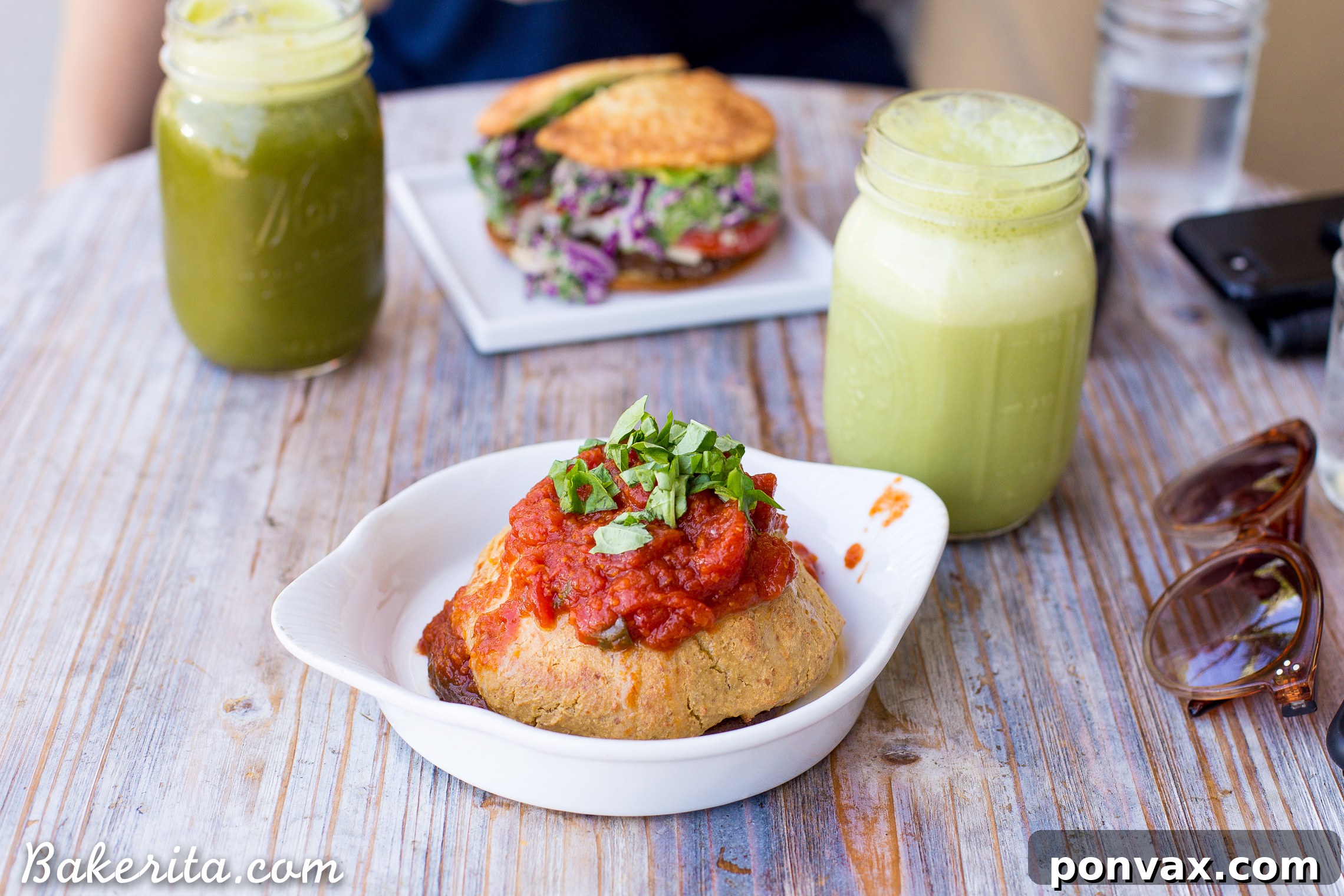 Santa Barbara RV Adventure with a Refreshing Peach Tomato Salad 13 Vegan Veggie Parmesan from Green Table, a quinoa burger topped with sunflower almond dressing.