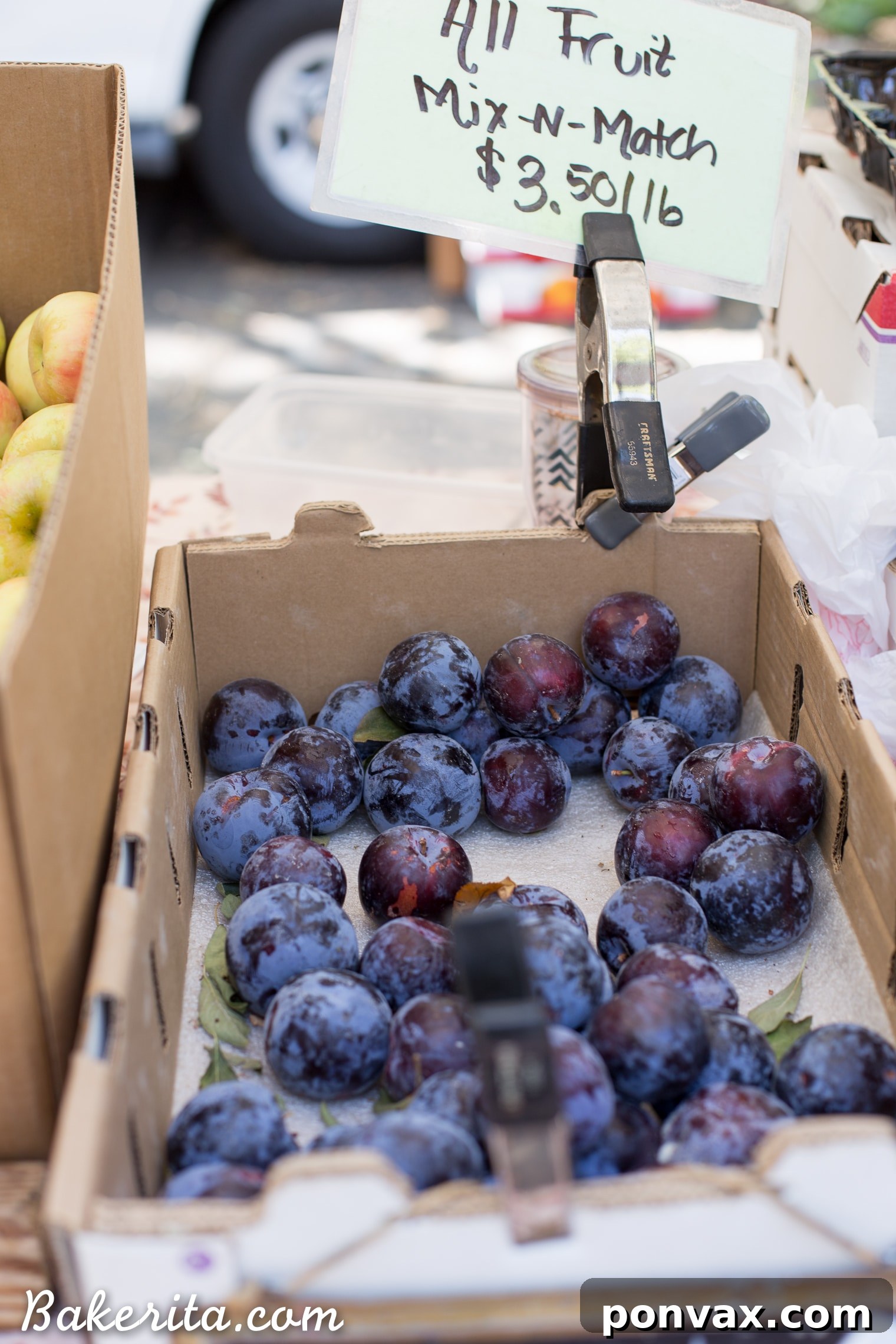 Santa Barbara RV Adventure with a Refreshing Peach Tomato Salad 14 A vibrant display of fresh produce at Santa Barbara's Farmers Market, showcasing colorful fruits and vegetables.