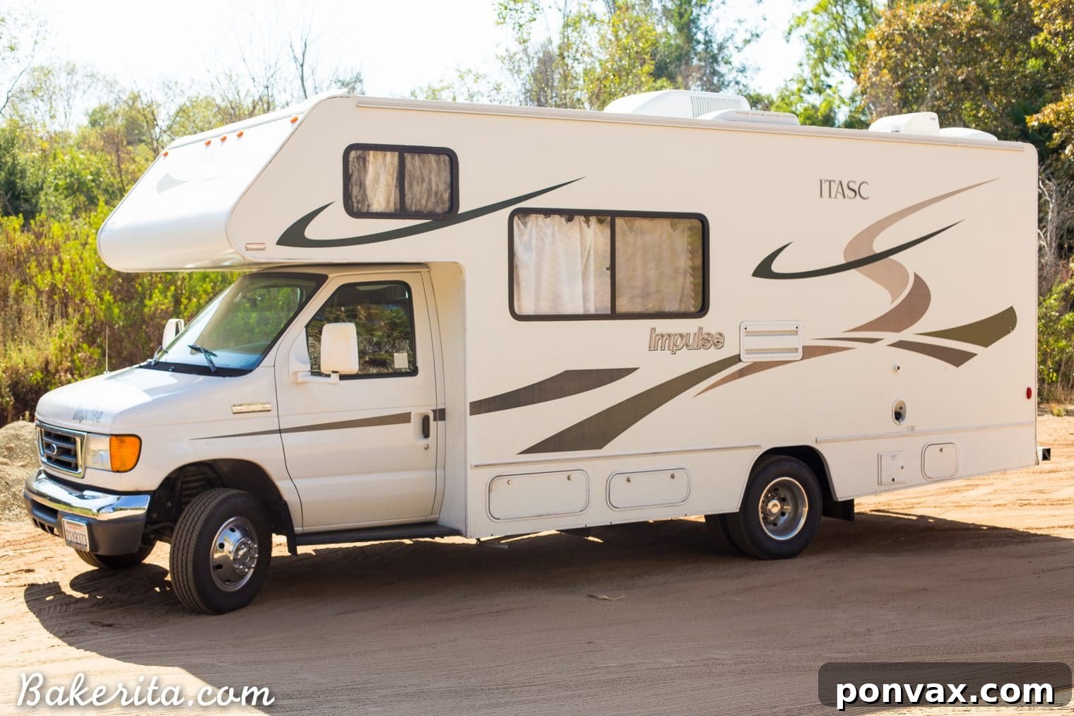 Santa Barbara RV Adventure with a Refreshing Peach Tomato Salad 3 The Leamon Party Bus RV, a cozy Type C motorhome, parked amidst a scenic California landscape.