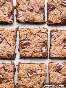 These Chocolate Chip Pumpkin Blondies have a super chewy, fudgy texture with the warmth of pumpkin spices and gooey, melted chocolate chunks. You're going to love these gluten-free, paleo and vegan pumpkin blondies.