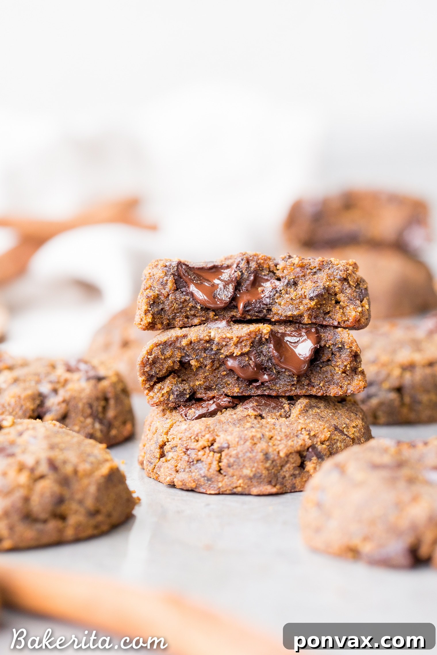 Pillowy Gluten-Free Pumpkin Chocolate Chip Cookies 4 A stack of perfectly baked gluten-free, paleo, and vegan chocolate chip pumpkin cookies, ready to be enjoyed.