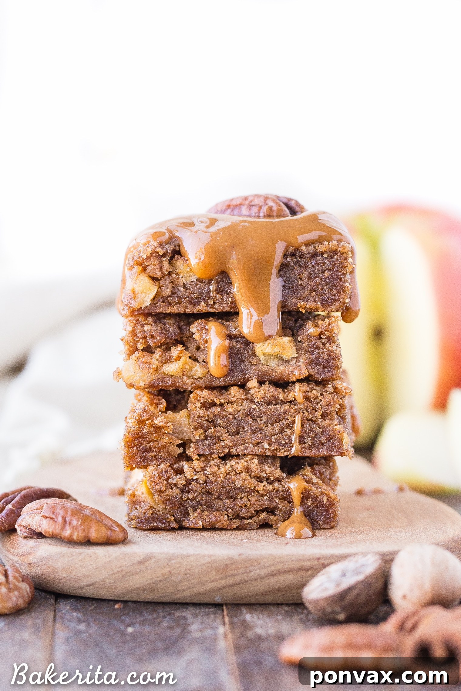 Close-up of a stack of healthy Apple Blondies, showcasing their moist texture and golden hue.
