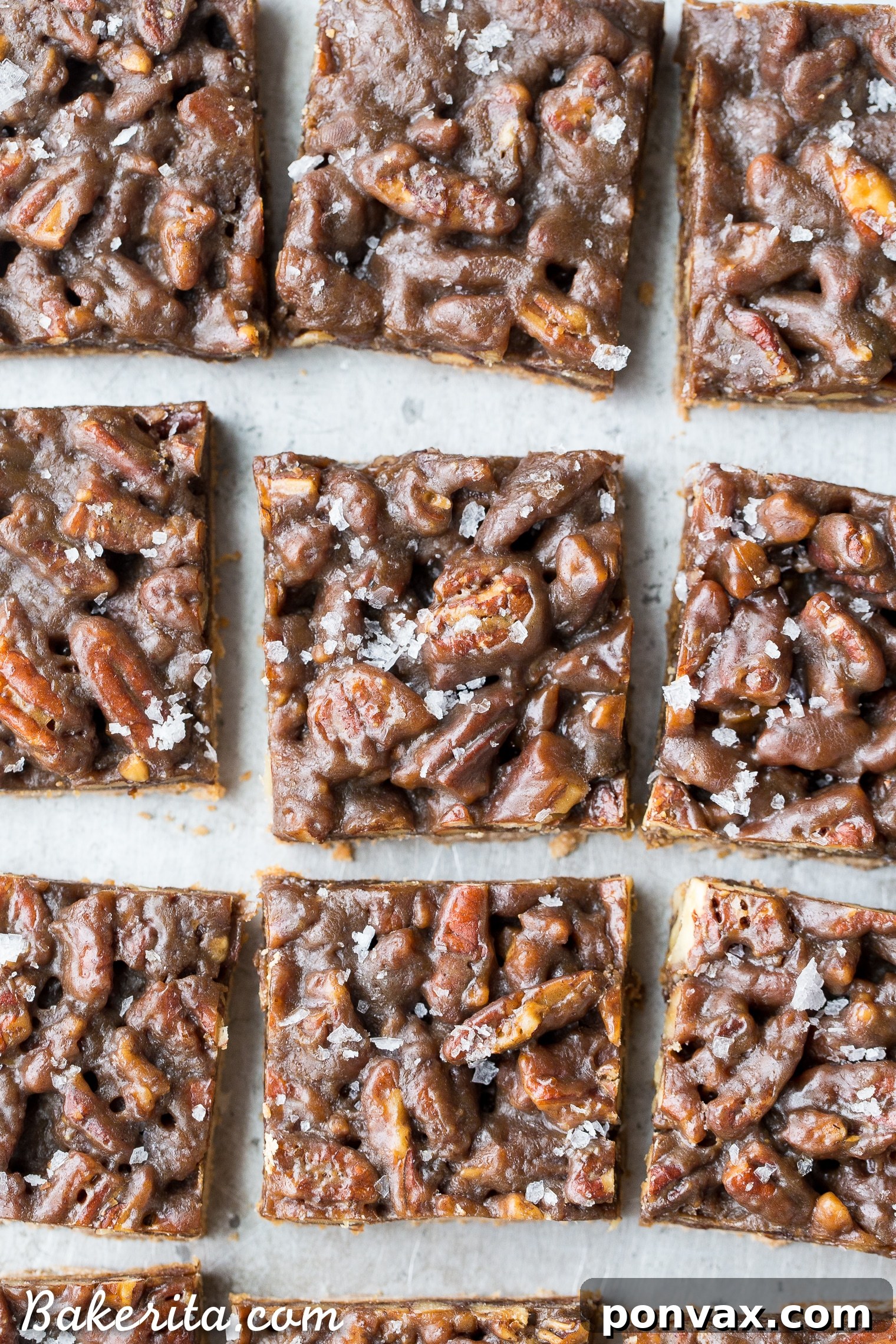 Thick and caramelly Pecan Pie Bars with a crispy coconut flour shortbread crust and gooey pecan filling. Gluten-free, paleo, and vegan, perfect for dessert spreads.