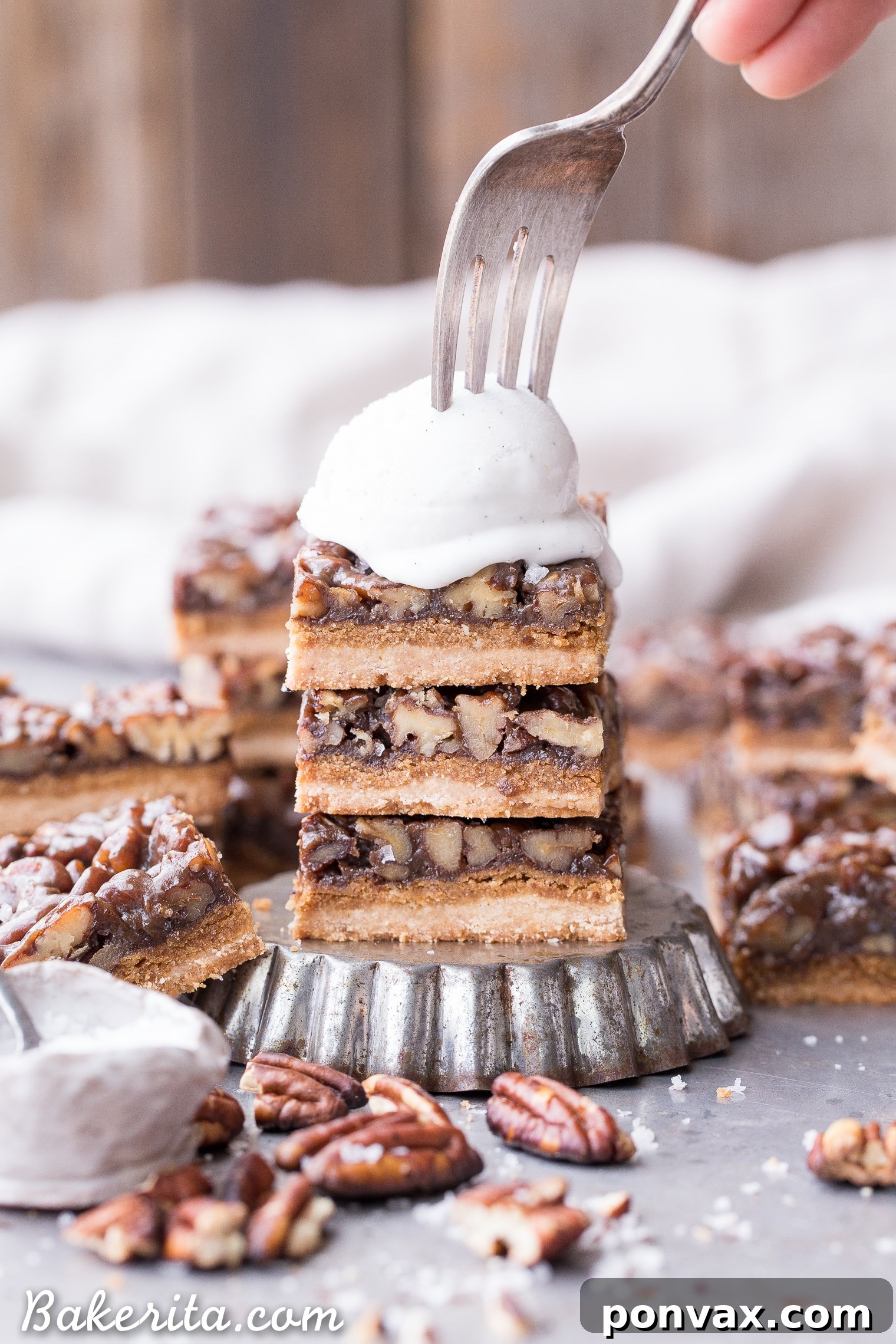 Thick and caramelly Pecan Pie Bars with a crispy coconut flour shortbread crust and gooey pecan filling. Gluten-free, paleo, and vegan, perfect for dessert spreads.