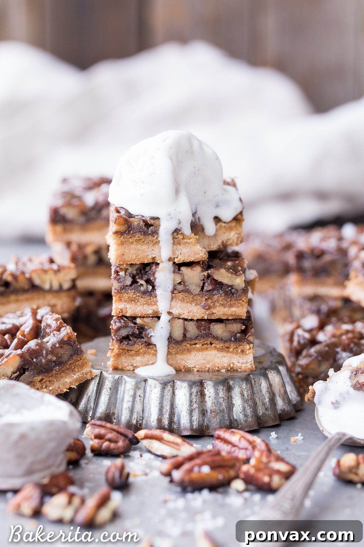 Thick and caramelly Pecan Pie Bars with a crispy coconut flour shortbread crust and gooey pecan filling. Gluten-free, paleo, and vegan, perfect for dessert spreads.