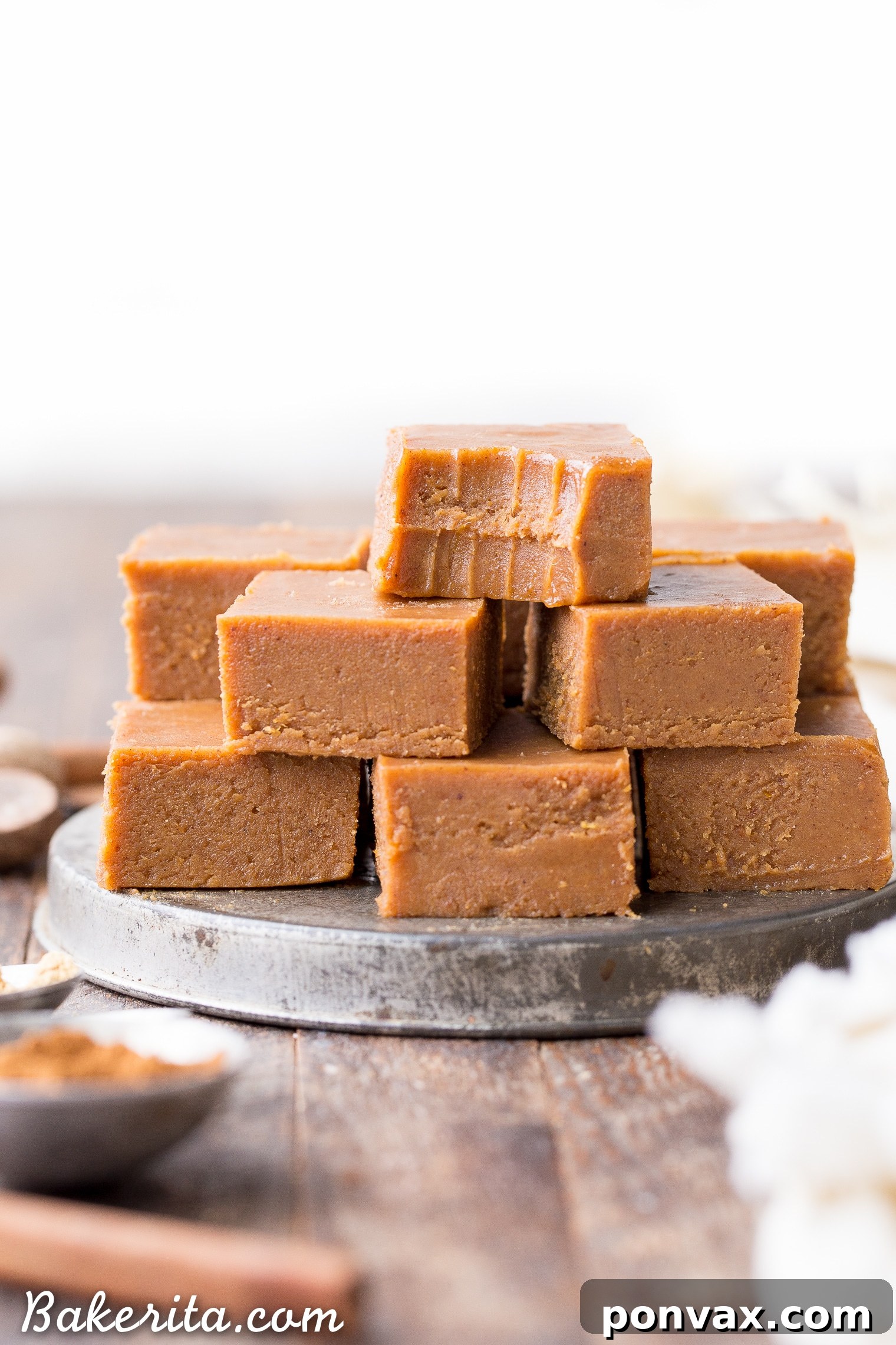 This Raw Vegan Pumpkin Spice Fudge is an easy-to-make, no-cooking-necessary treat that melts in your mouth and tastes like fall! With just five ingredients, this paleo and vegan homemade fudge couldn't be easier to make.