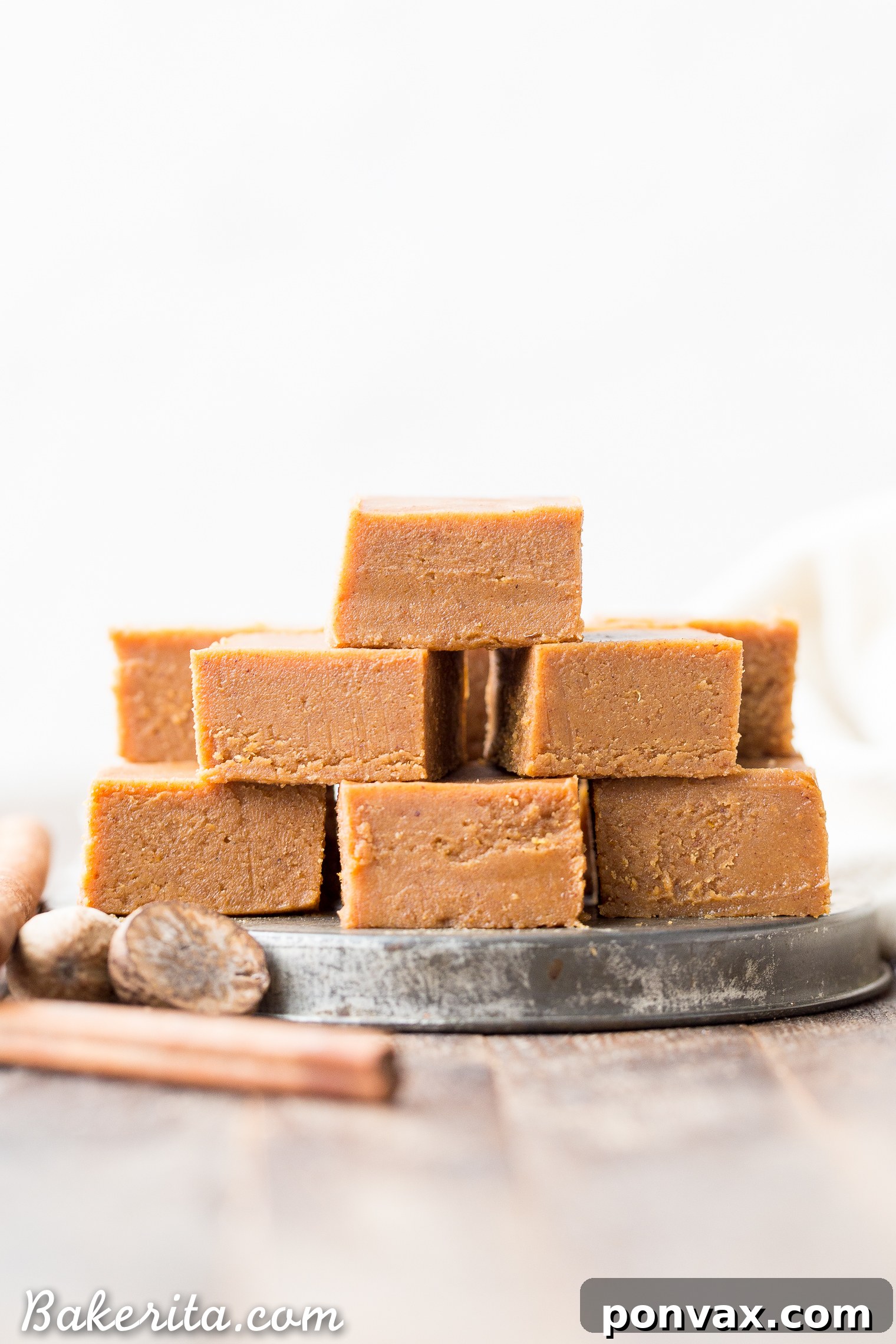 This Raw Vegan Pumpkin Spice Fudge is an easy-to-make, no-cooking-necessary treat that melts in your mouth and tastes like fall! With just five ingredients, this paleo and vegan homemade fudge couldn't be easier to make.
