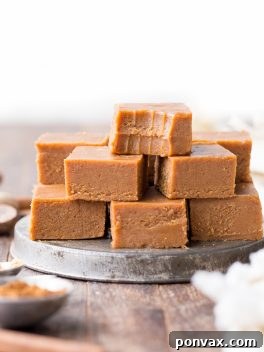 This Pumpkin Spice Fudge is an easy-to-make, no-cooking-necessary treat that melts in your mouth and tastes like fall! With just five ingredients, this homemade fudge couldn't be easier to make.