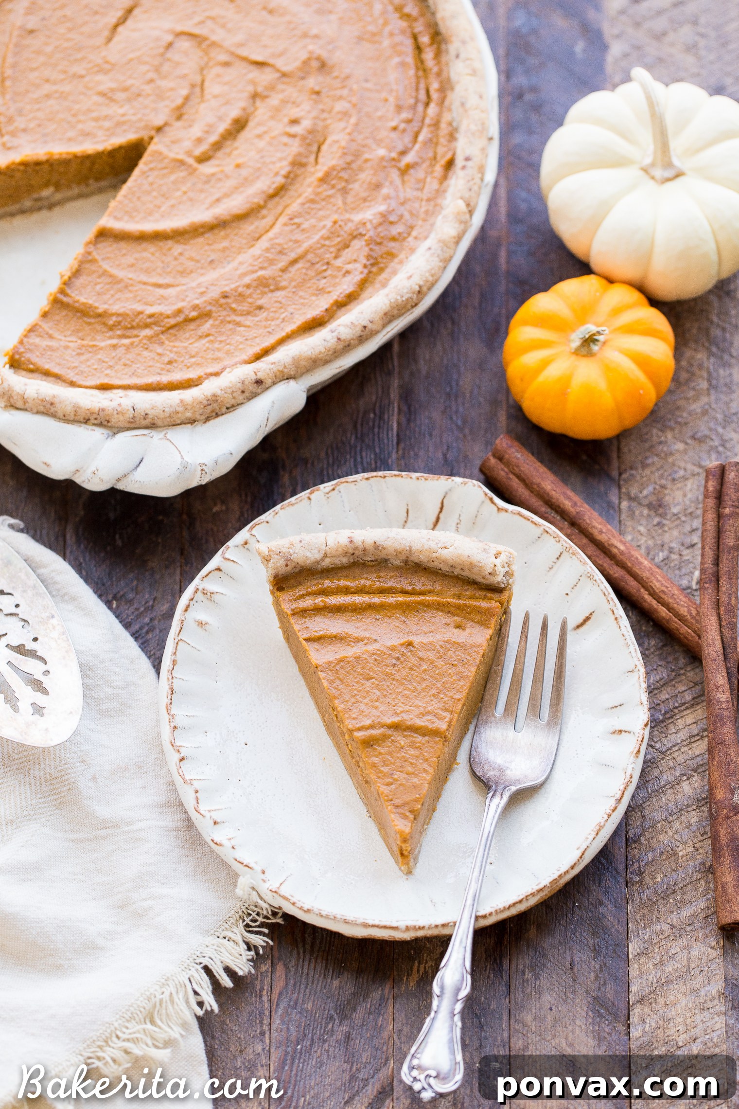 Silky Smooth Vegan Pumpkin Pie Bliss 3 Close-up of a perfectly baked Paleo and Vegan Pumpkin Pie, showcasing its smooth texture and golden crust, ready for holiday celebrations.
