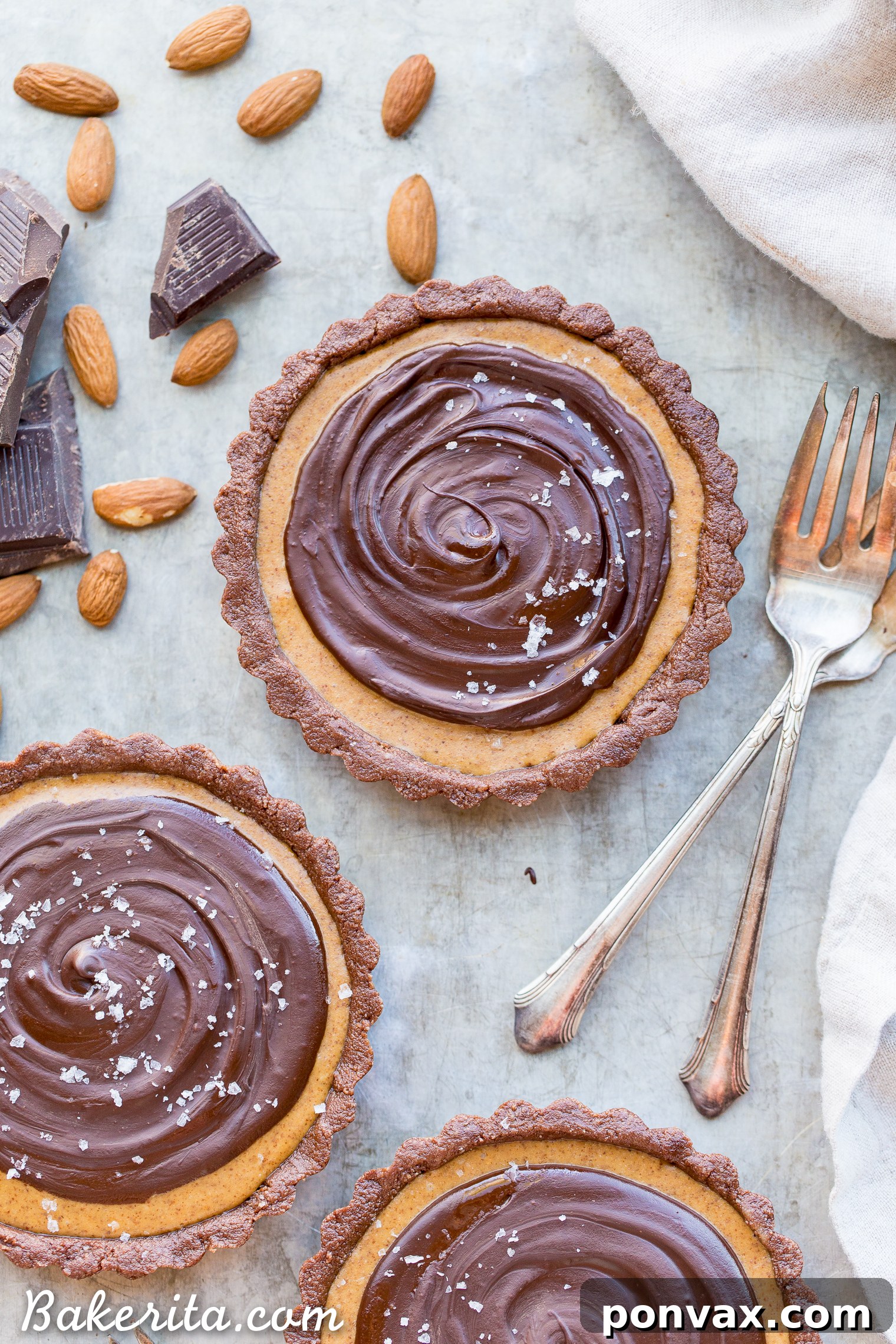 Vegan Chocolate Almond Butter Dream Tart 2 This No Bake Chocolate Almond Butter Tart tastes like a giant almond butter cup! There's no baking required and it's gluten-free, paleo, and vegan. You'll adore this melt in your mouth tart.