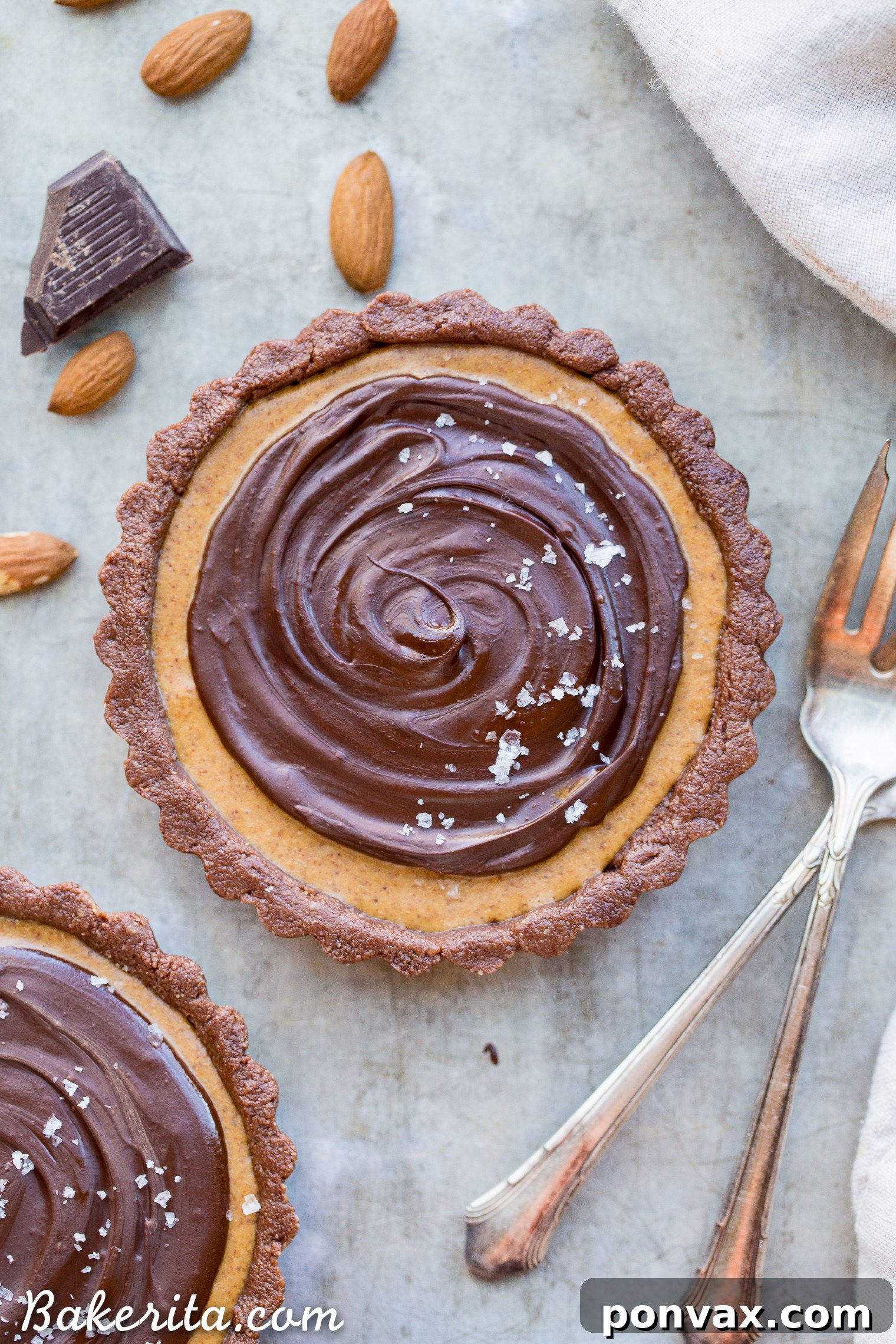 Vegan Chocolate Almond Butter Dream Tart 4 This No Bake Chocolate Almond Butter Tart tastes like a giant almond butter cup! There's no baking required and it's gluten-free, paleo, and vegan. You'll adore this melt in your mouth tart.
