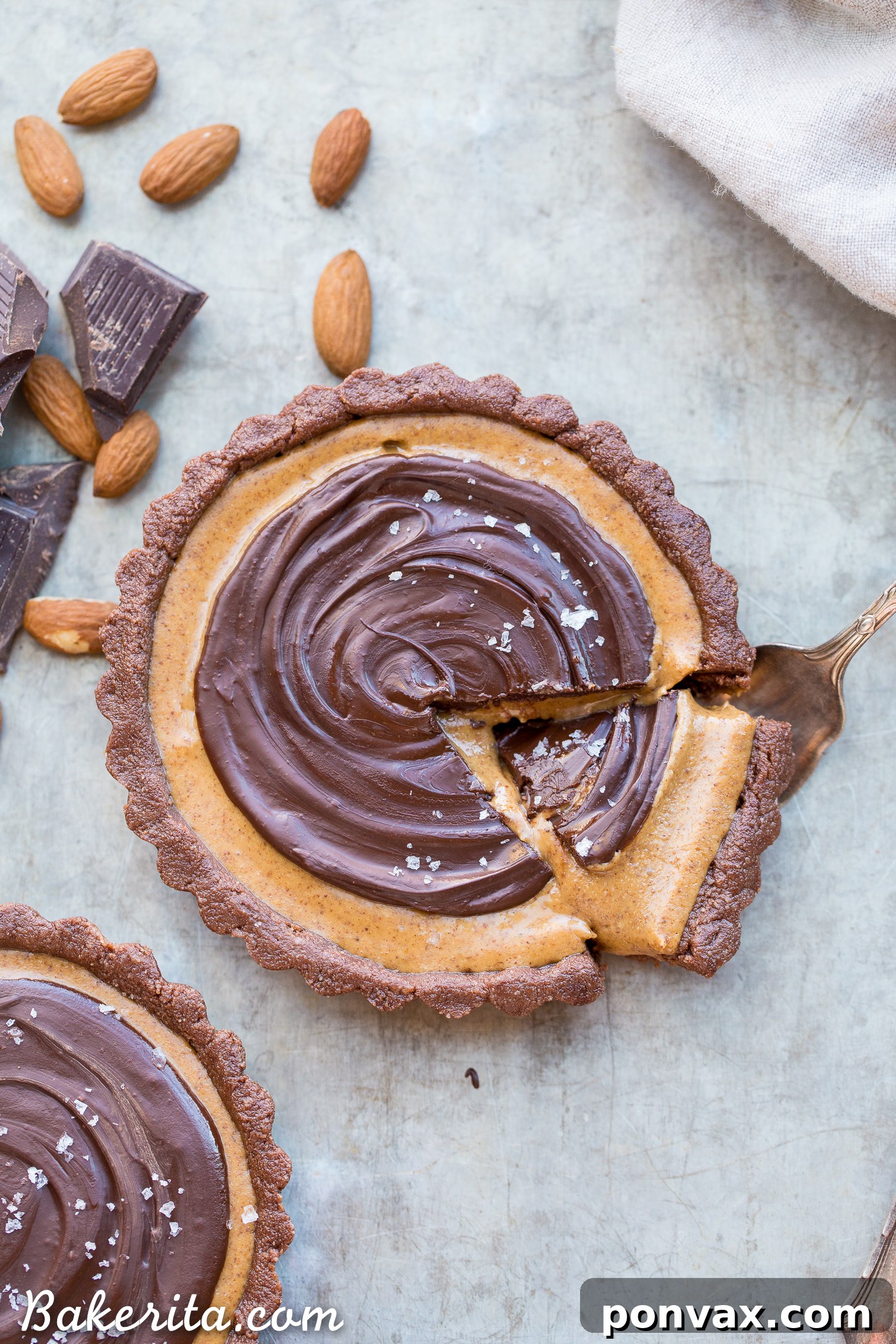 Vegan Chocolate Almond Butter Dream Tart 6 This No Bake Chocolate Almond Butter Tart tastes like a giant almond butter cup! There's no baking required and it's gluten-free, paleo, and vegan. You'll adore this melt in your mouth tart.